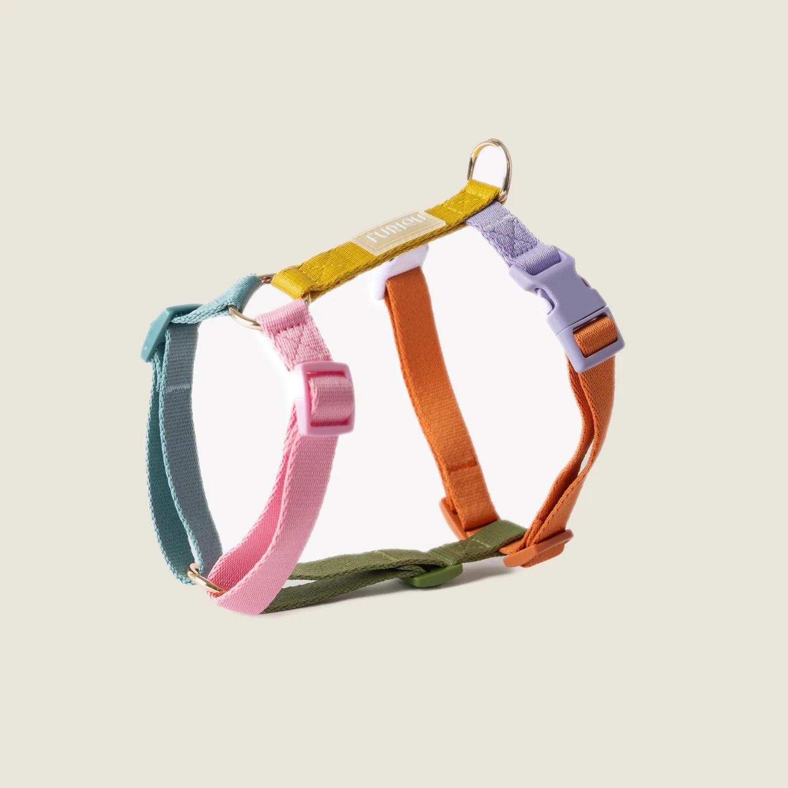 Colorful Rainbow Dog Harness by FURLOU featuring adjustable straps in pink, blue, orange, green, and purple.