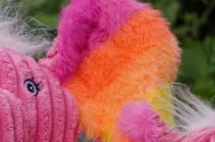 Colorful plush Rainbow Elephant toy featuring soft pink and orange faux fur, perfect for playful dogs.