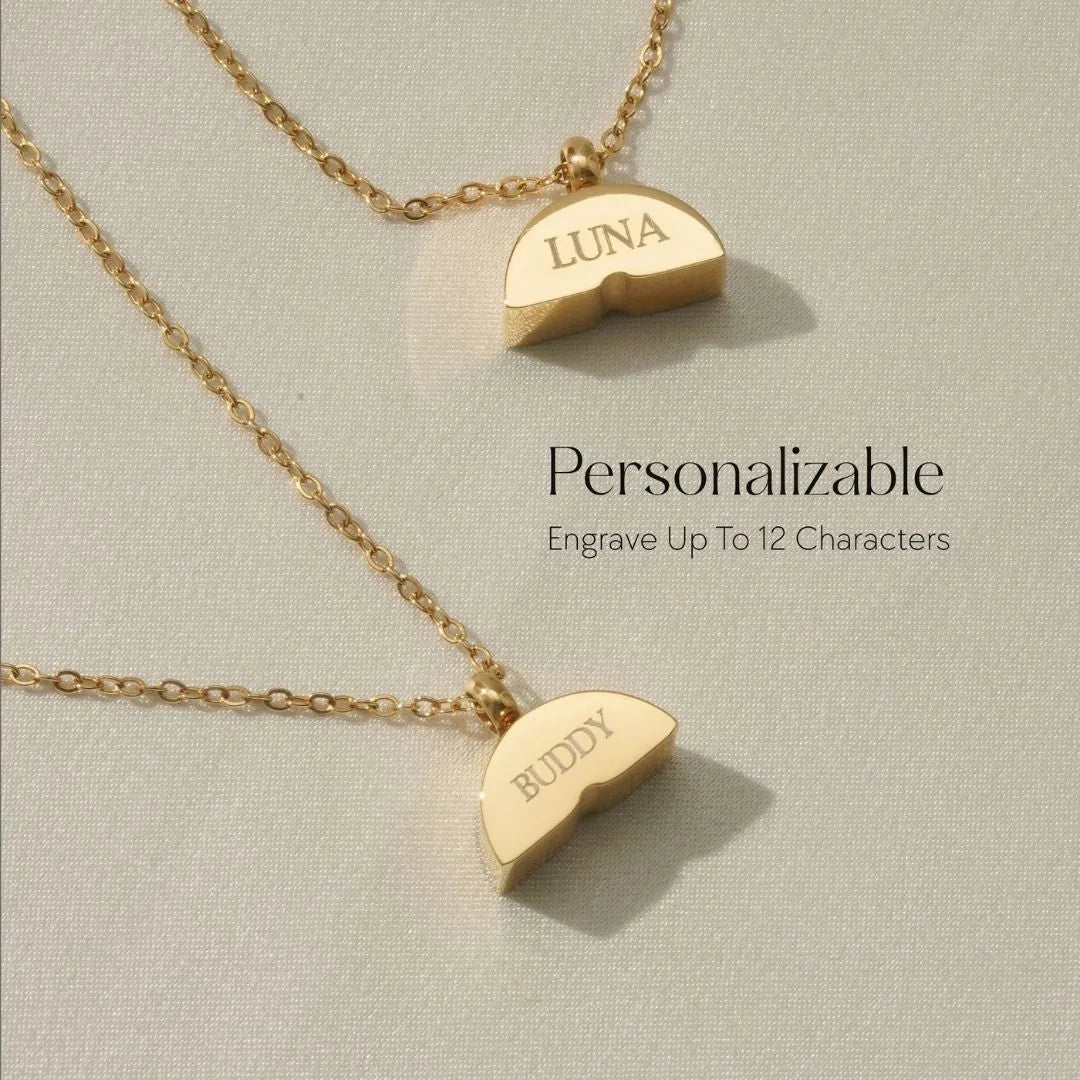 Gold memorial necklaces featuring personalized pendants engraved with "LUNA" and "BUDDY," showcasing heartfelt connection.