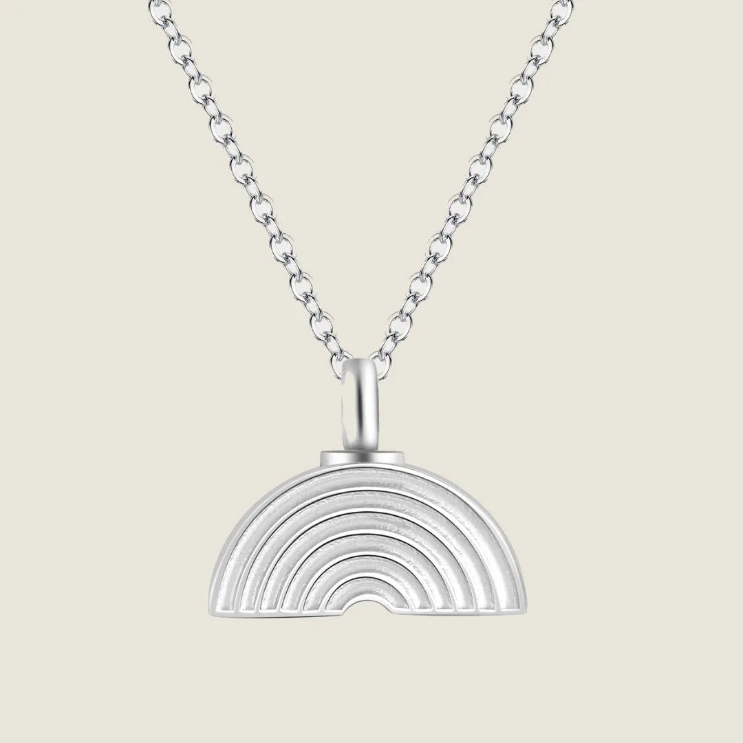Silver rainbow pendant memorial necklace on a delicate chain, symbolizing enduring connection and cherished memories.