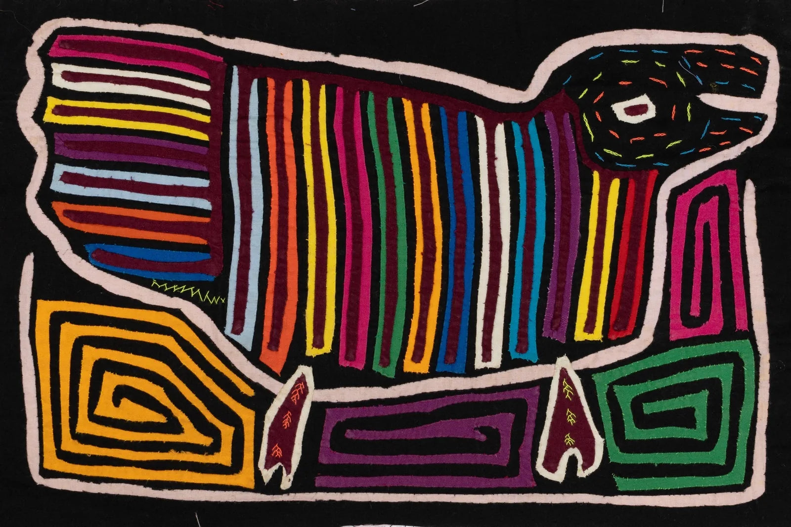 Hand-stitched Mola featuring a colorful striped puppy design against a dark background, showcasing vibrant hues and intric...