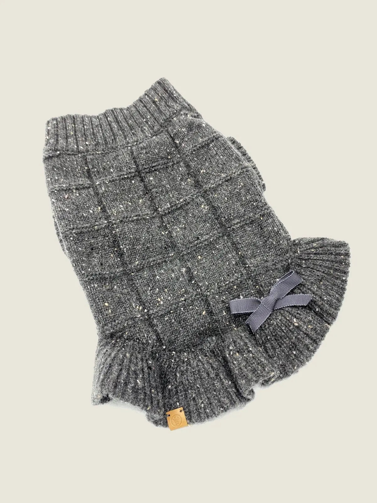 Charcoal cashmere dog sweater featuring ruffle detail and grosgrain bow, ideal for small to medium-sized dogs.