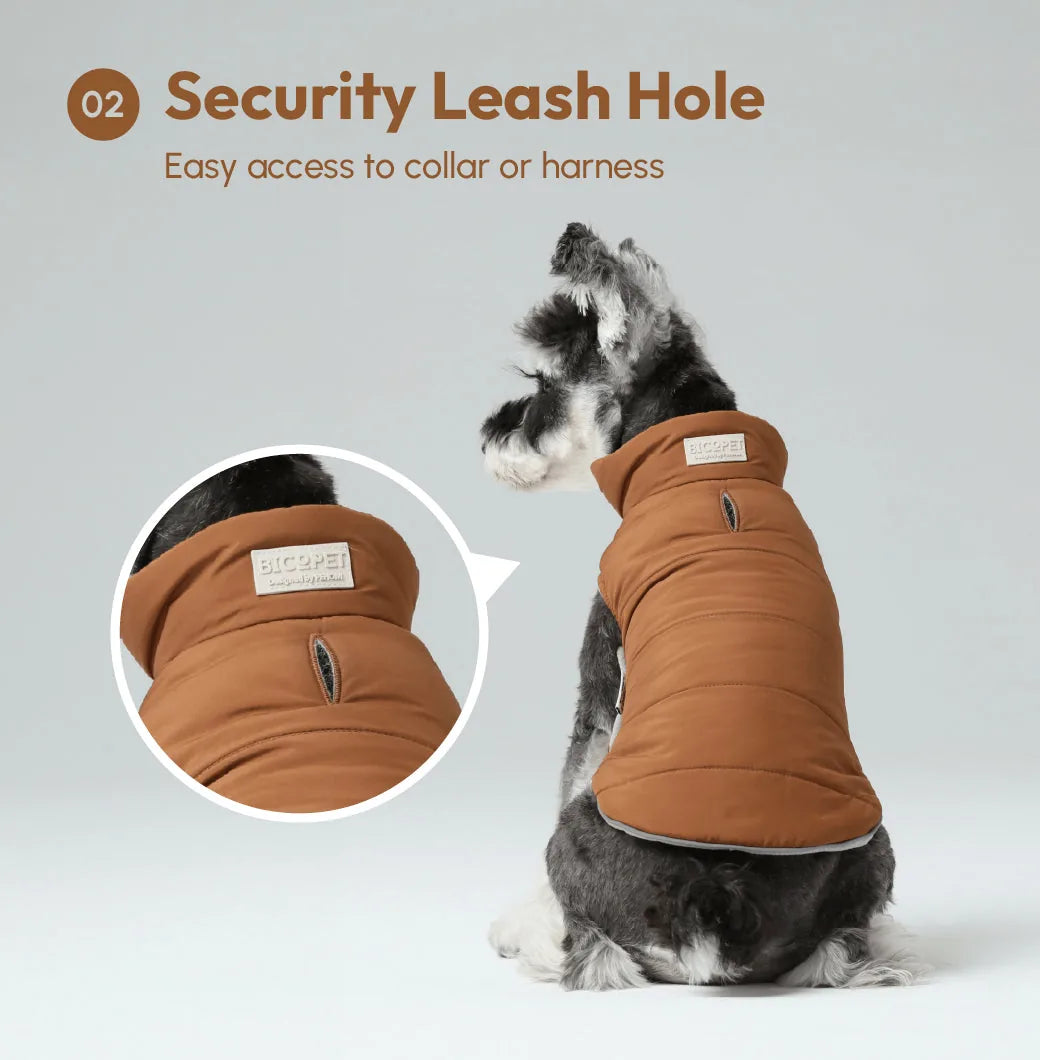 Reversible dog vest jacket in orange with a security leash hole for easy access to collar or harness.