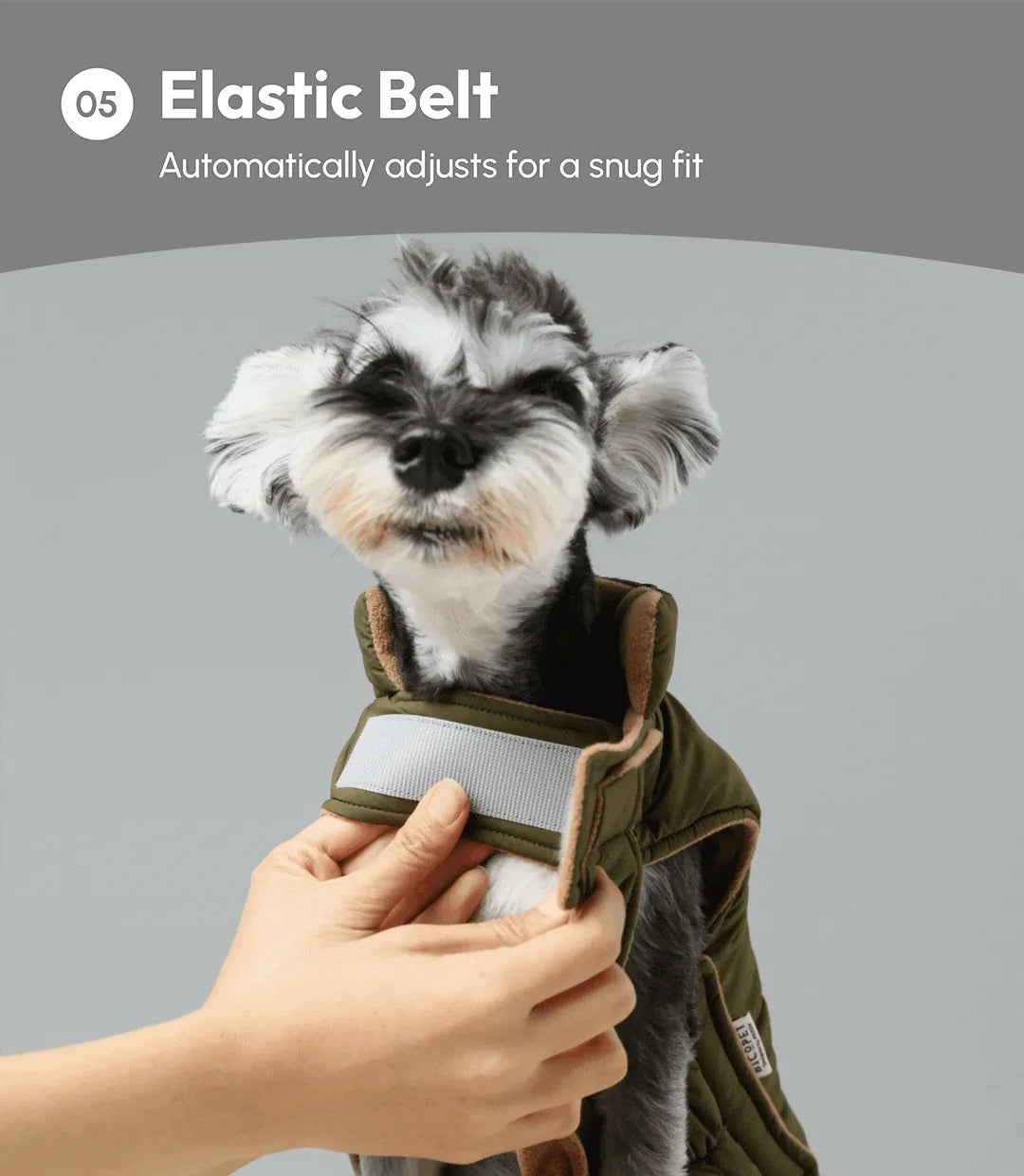 Reversible orange-grey dog vest jacket with elastic belt for a snug fit, featuring cozy fleece lining.