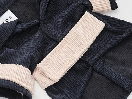 Velvet double collar blazer in blue and beige with ribbed texture, designed for dogs to keep warm and stylish.