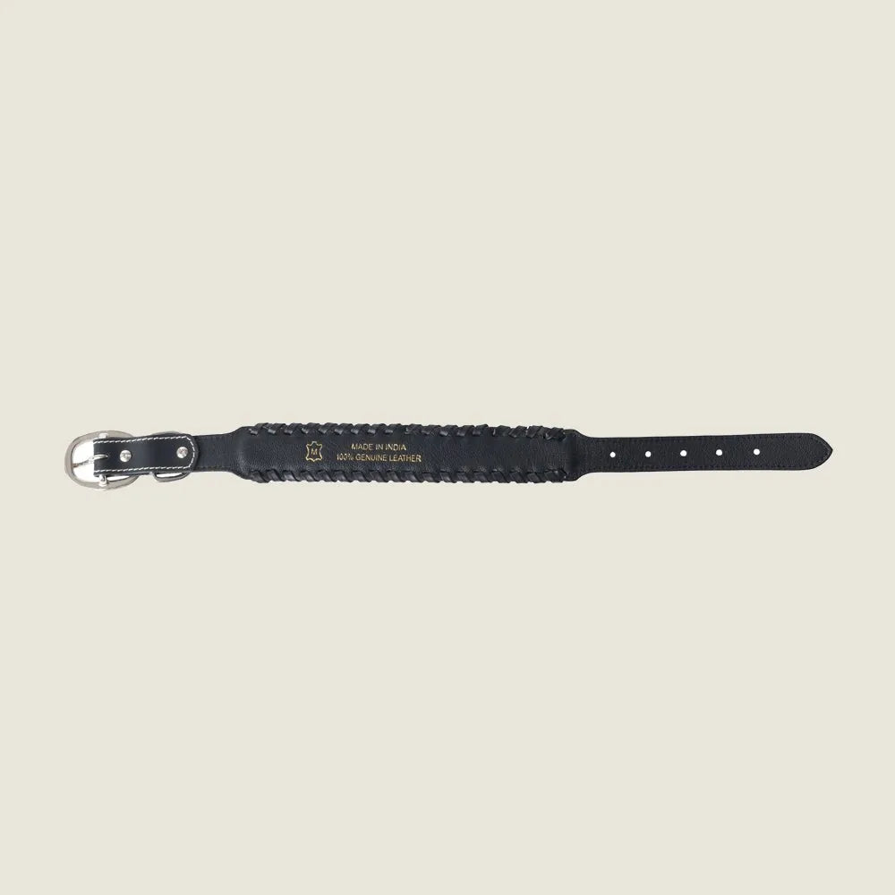 Black handcrafted leather dog collar with braided design and adjustable length, featuring a silver buckle.