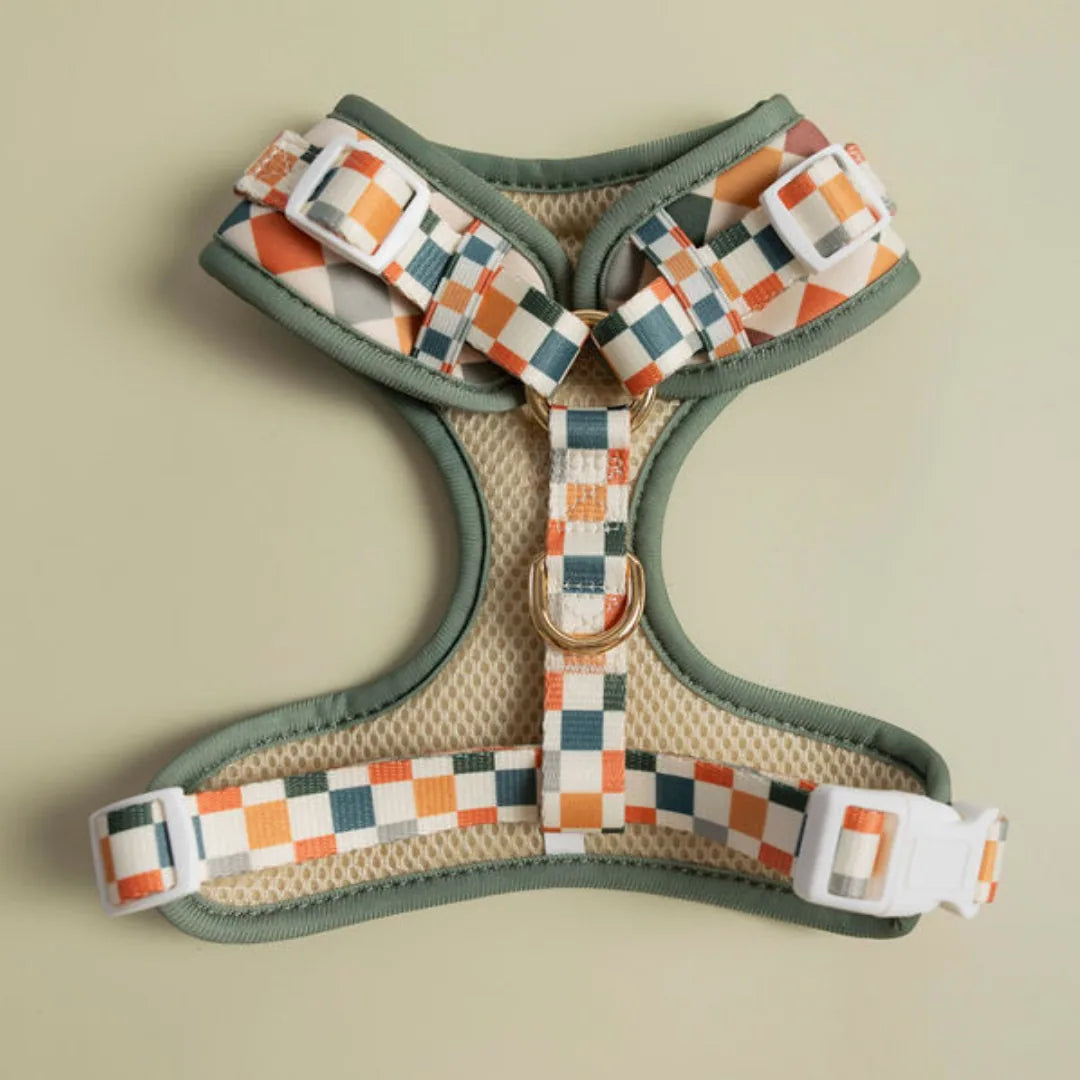 Sage & Cider adjustable dog harness featuring green accents and a breathable mesh lining with a stylish plaid pattern.