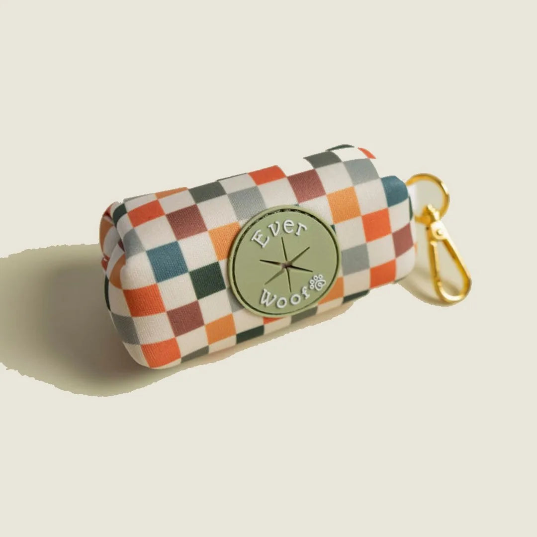 Sage and cider checkered waste bag holder with a zinc alloy hook, featuring an embossed EverWoof logo.