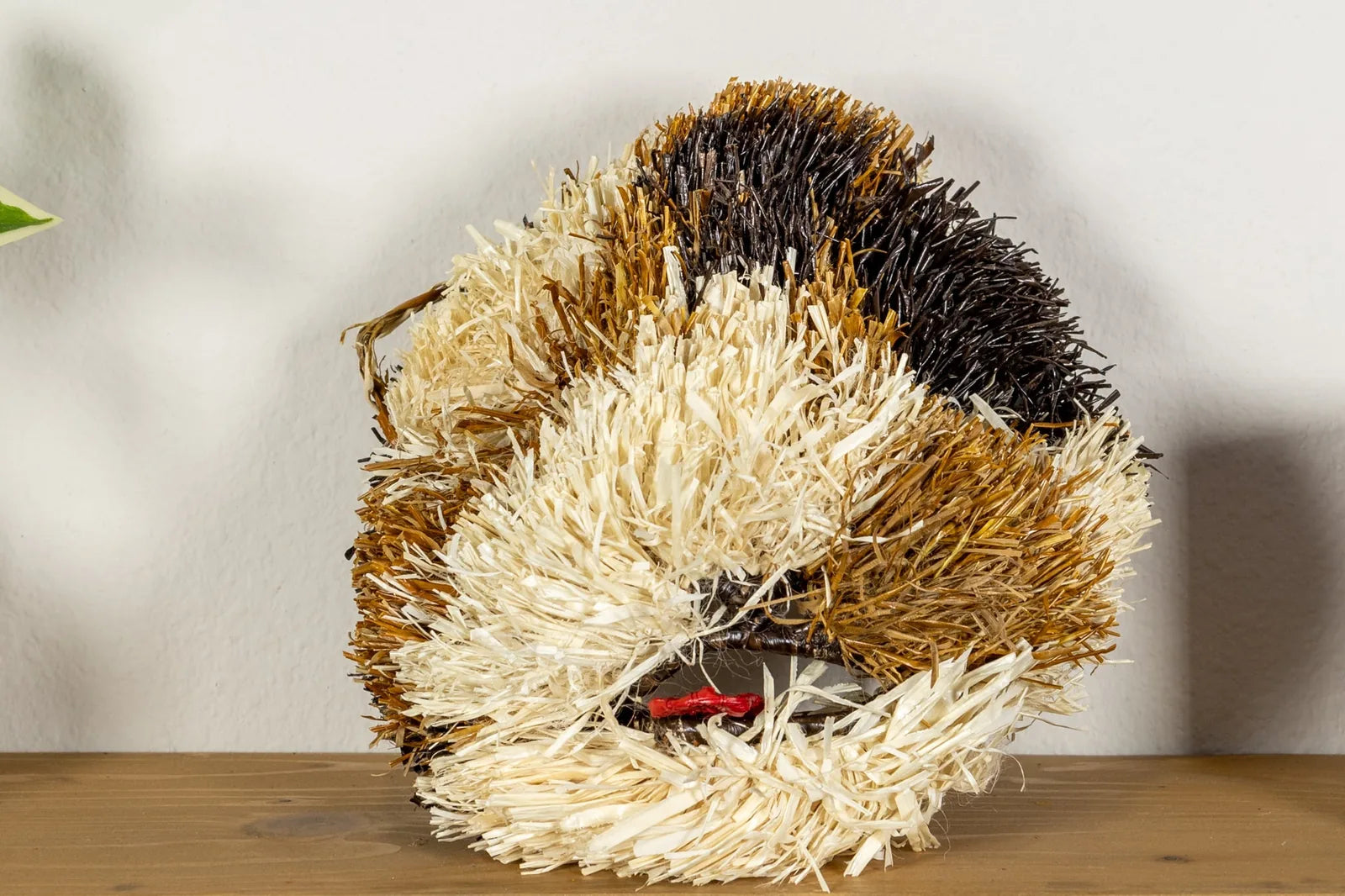 Handwoven Saint Bernard dog mask in earthy tones, featuring unique textures, perfect for wall decor or gifting.