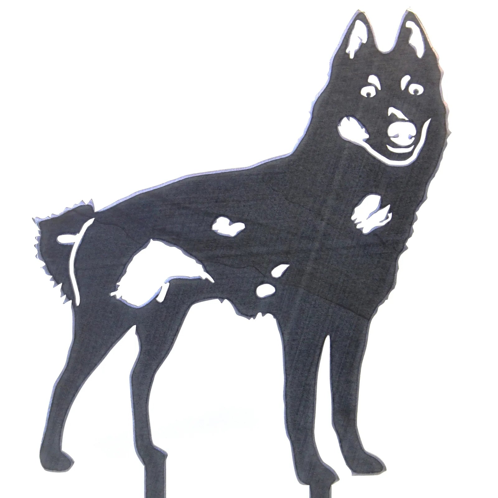 Black metal silhouette of a Schipperke dog, showcasing its playful stance and defining features for outdoor decoration.