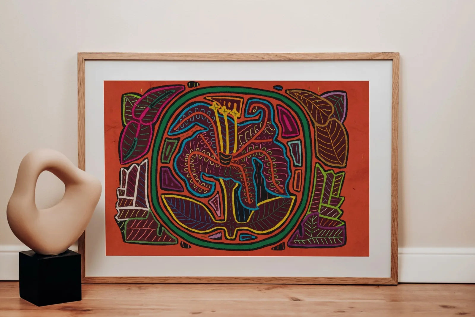 Hand-stitched tapestry featuring a colorful shaggy puppy dog with flowers, surrounded by vibrant leaf patterns.