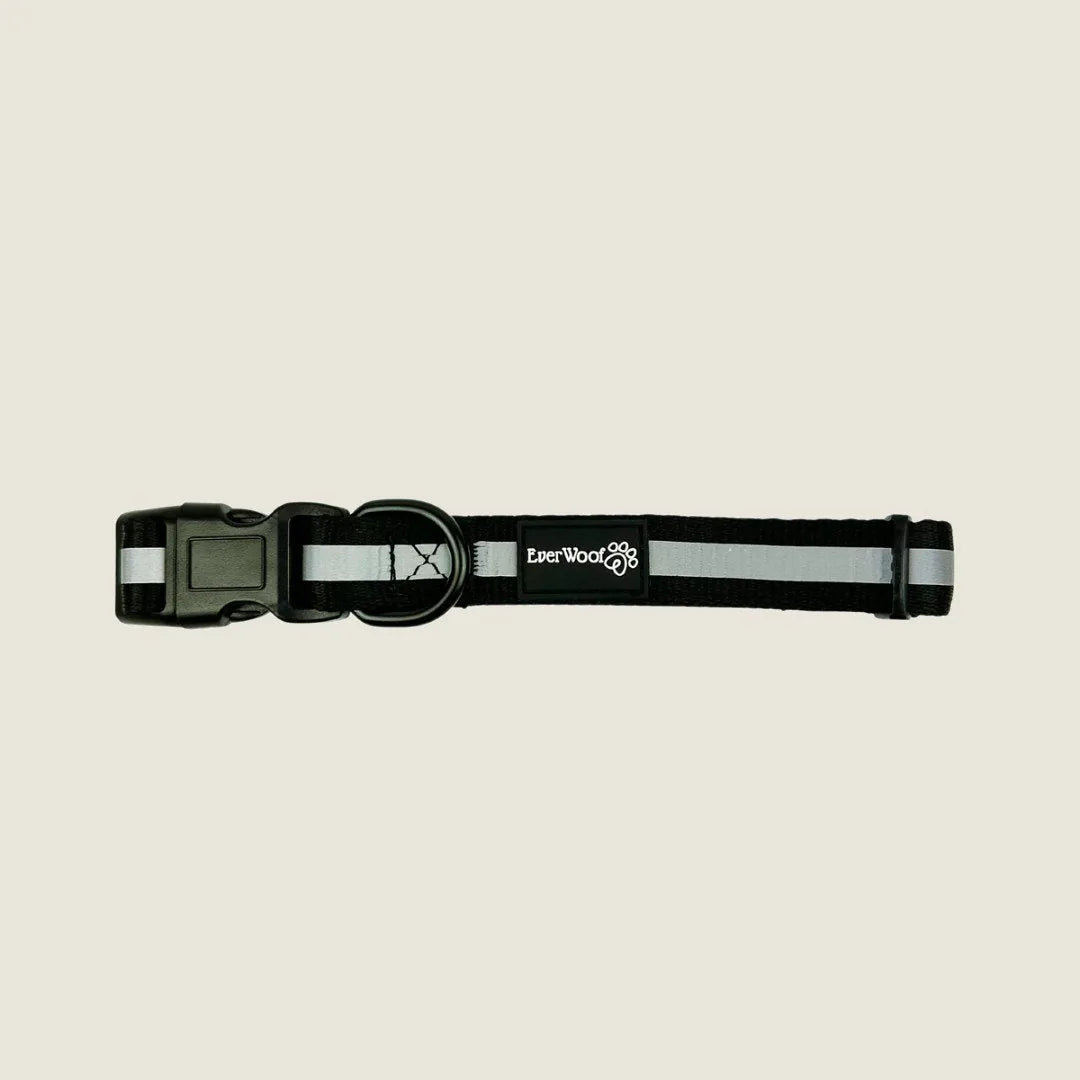 Adjustable black dog collar with reflective gray stripes and neoprene padding, branded with EverWoof logo.