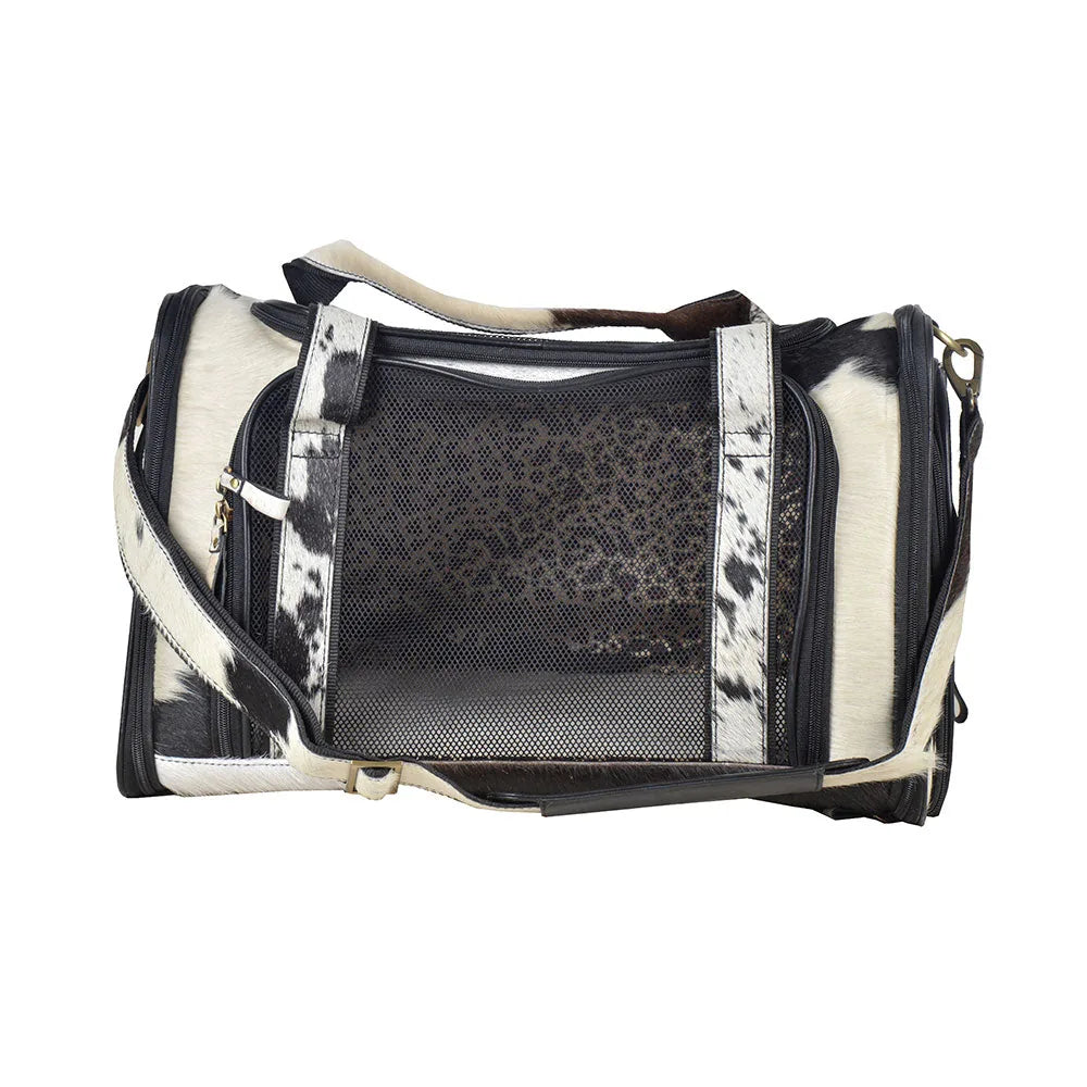 Stylish black and white hairon leather dog bag with a mesh panel, featuring a 12" handle and 22" shoulder strap.
