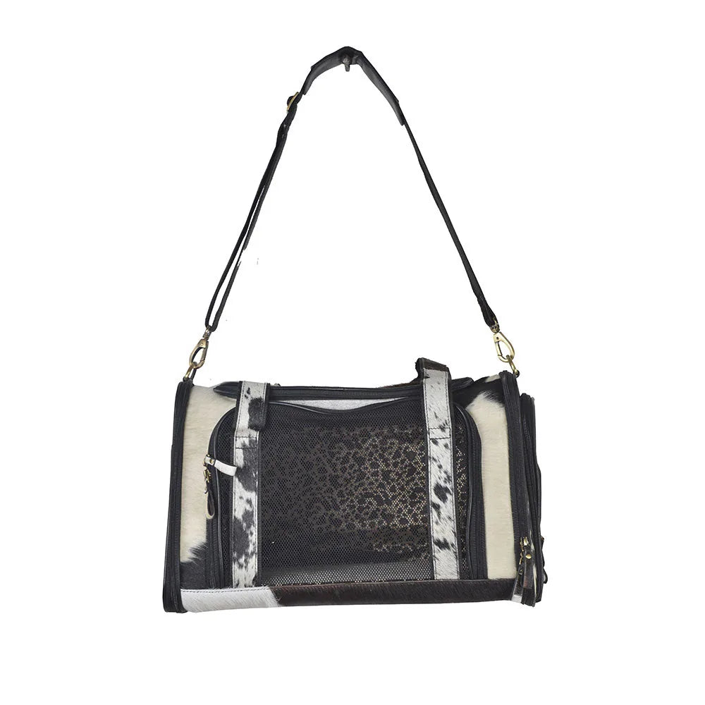 Sturdy black and white Smoke Hairon Leather Dog Bag with mesh detailing and adjustable straps for pet transport.