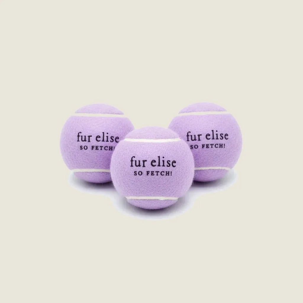 Lilac tennis ball pack with "fur elise SO FETCH!" text, made from pet-safe felt for durable playtime.