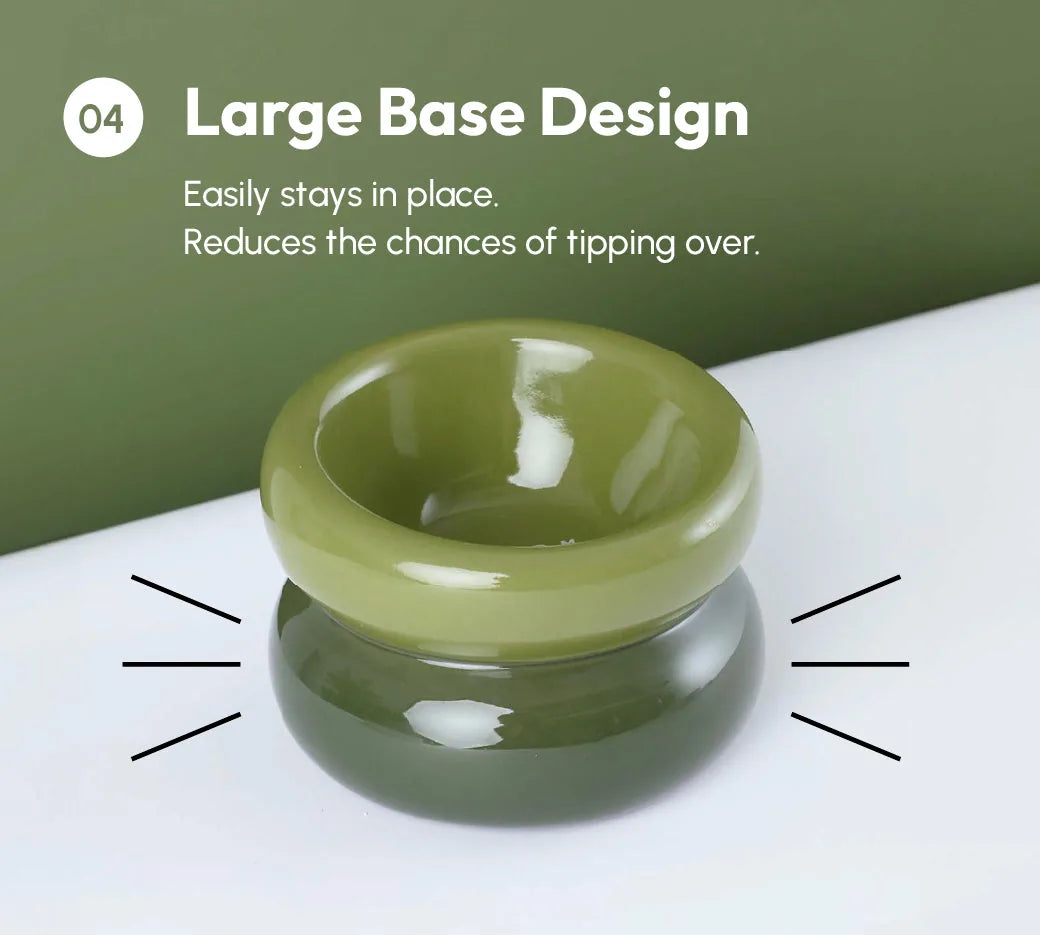 Avocado green pet bowl featuring a large base design to prevent tipping, ideal for comfortable feeding.