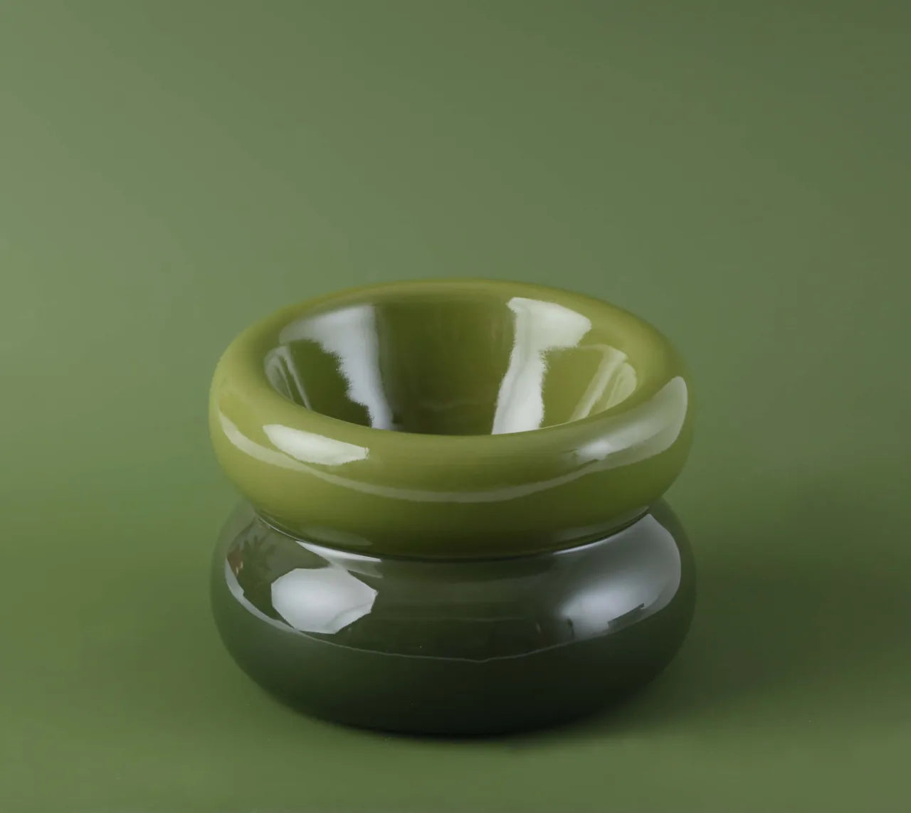 Avocado green soufflé pet bowl with a sleek design and smooth finish, perfect for comfortable feeding.