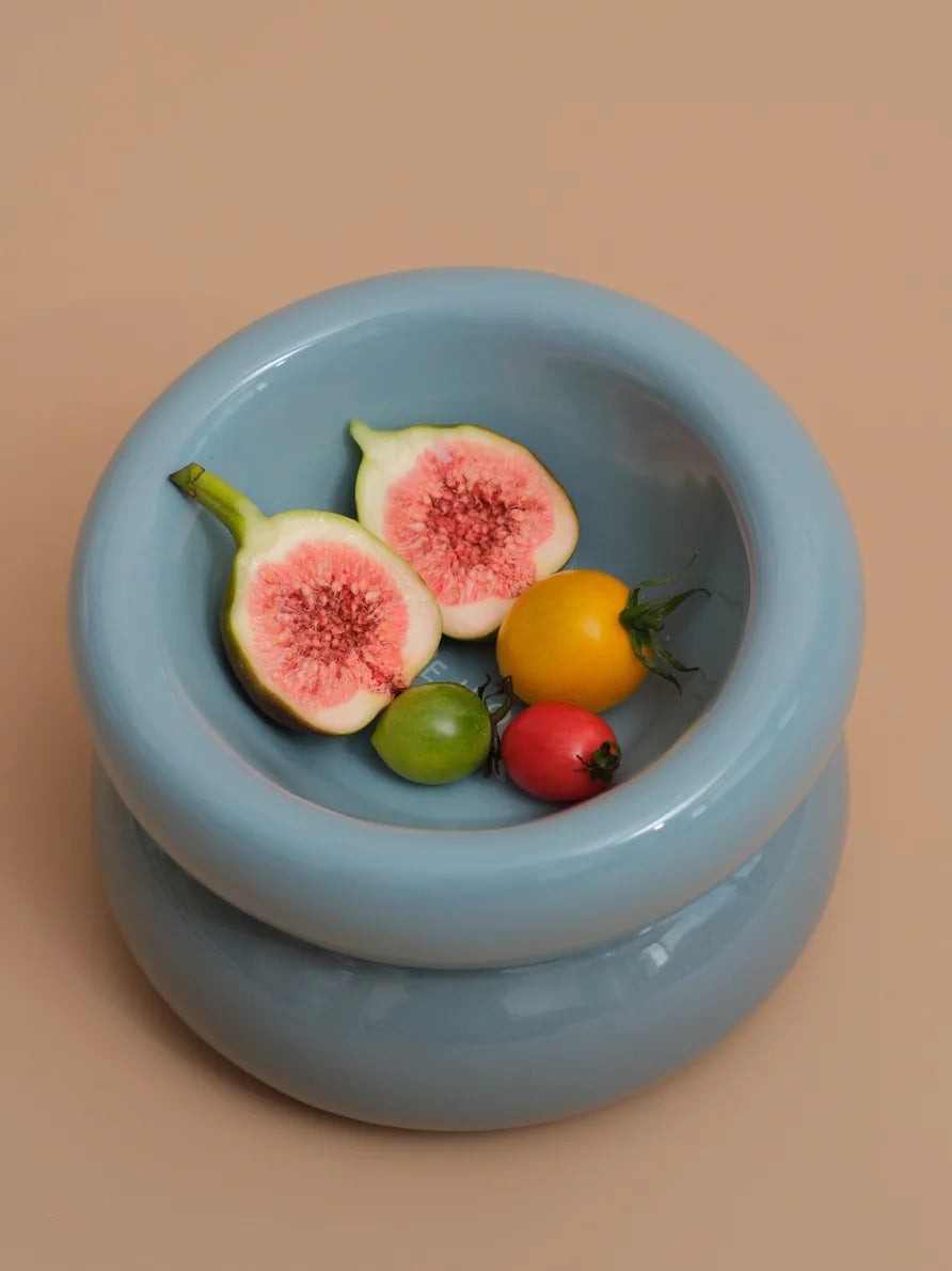 Frozen Blue Soufflé Pet Bowl featuring fresh fruits arranged inside, showcasing its unique design and glossy finish.