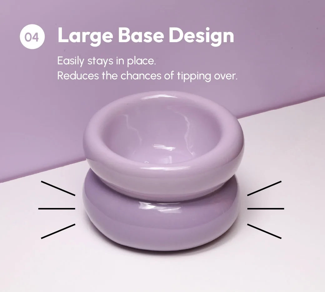 Purple soufflé pet bowl with a large base design, ensuring stability and reducing tipping during feeding.