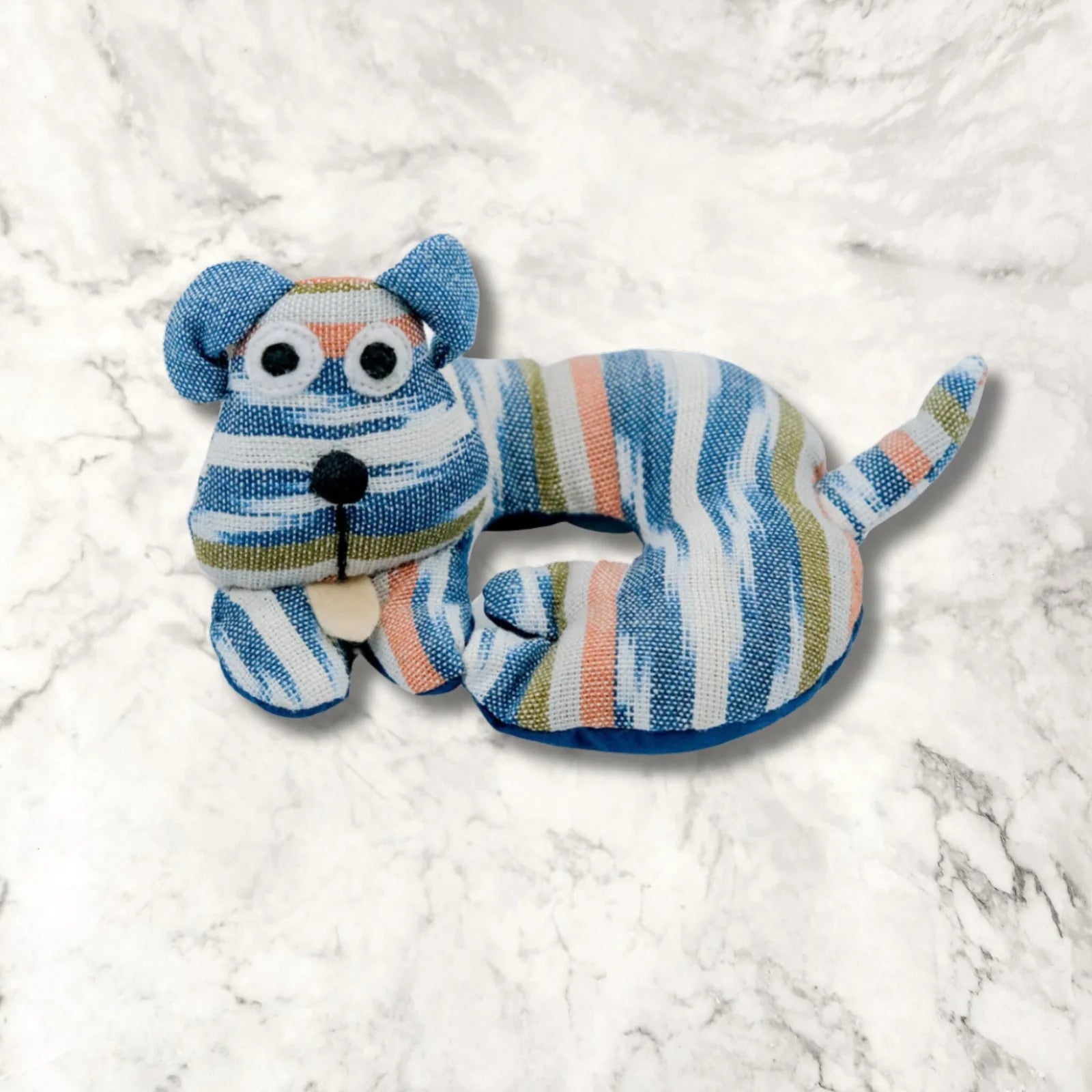Handmade blue and white striped dog trivet with a playful design, featuring colorful accents and a friendly expression.