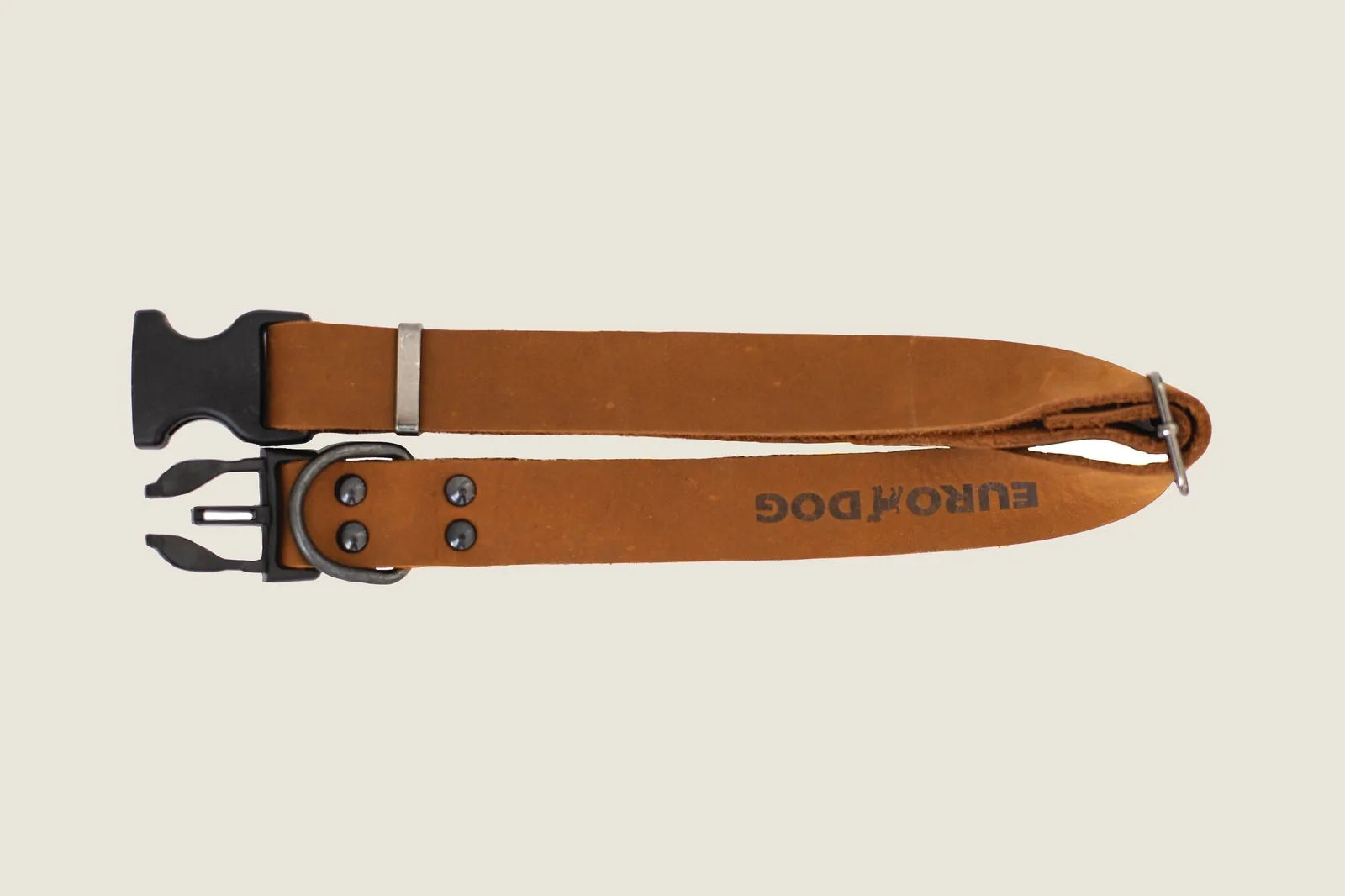Earth brown leather dog collar featuring durable construction and a quick-release buckle for easy use.