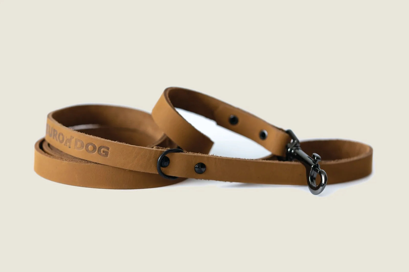 Sport style khaki leather dog leash with black hardware, featuring a sturdy design for everyday use.