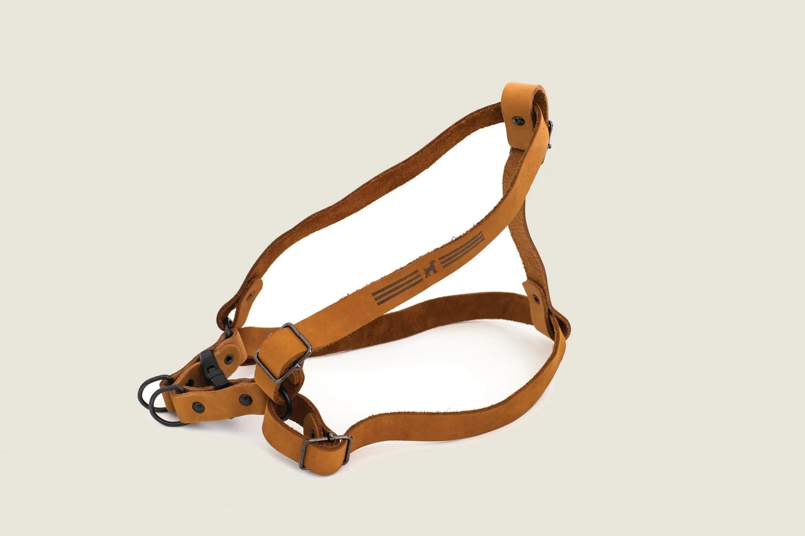 Sport style leather step-in harness in earth brown, featuring a no-stitch design and strong YKK buckles for durability.