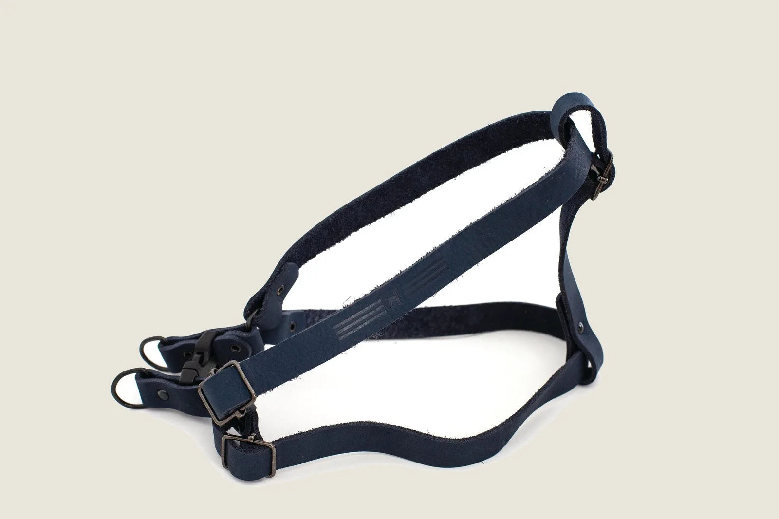 Sport style leather step-in harness in midnight black with adjustable straps and quick-release buckles.