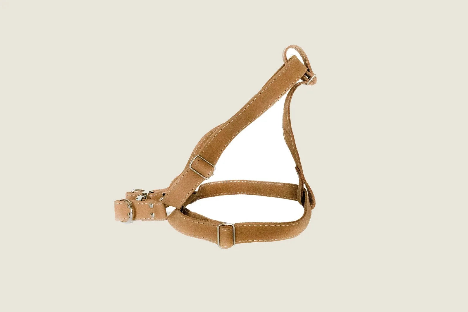 Tan leather Step In Dog Harness with polyester stitching and European steel hardware, designed for comfort and style.
