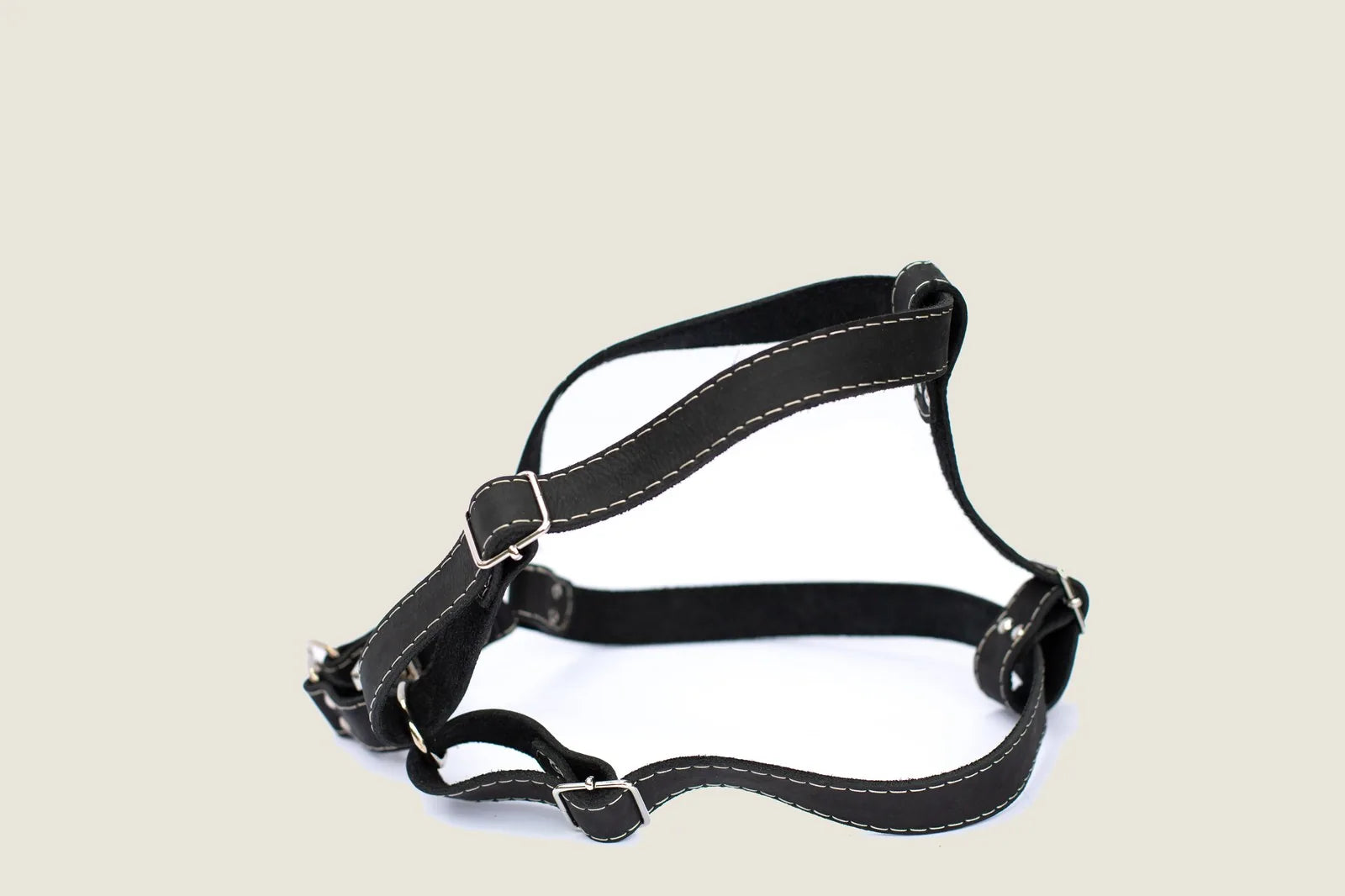 Step in leather dog harness in black, featuring durable stitching and a comfortable design for everyday walks.