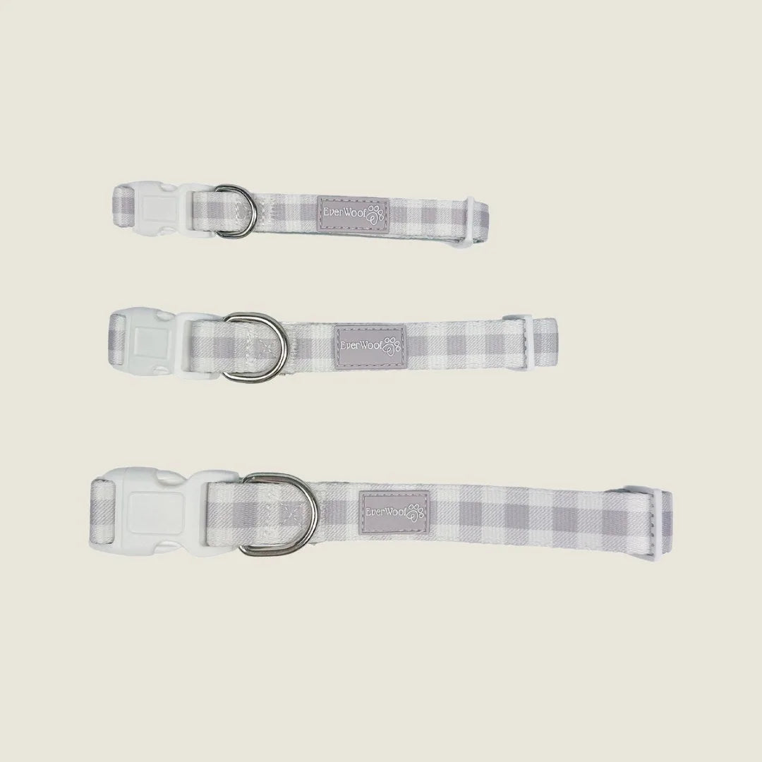 Adjustable Sugar Plum collar by EverWoof featuring a soft plaid design in light purple and white.