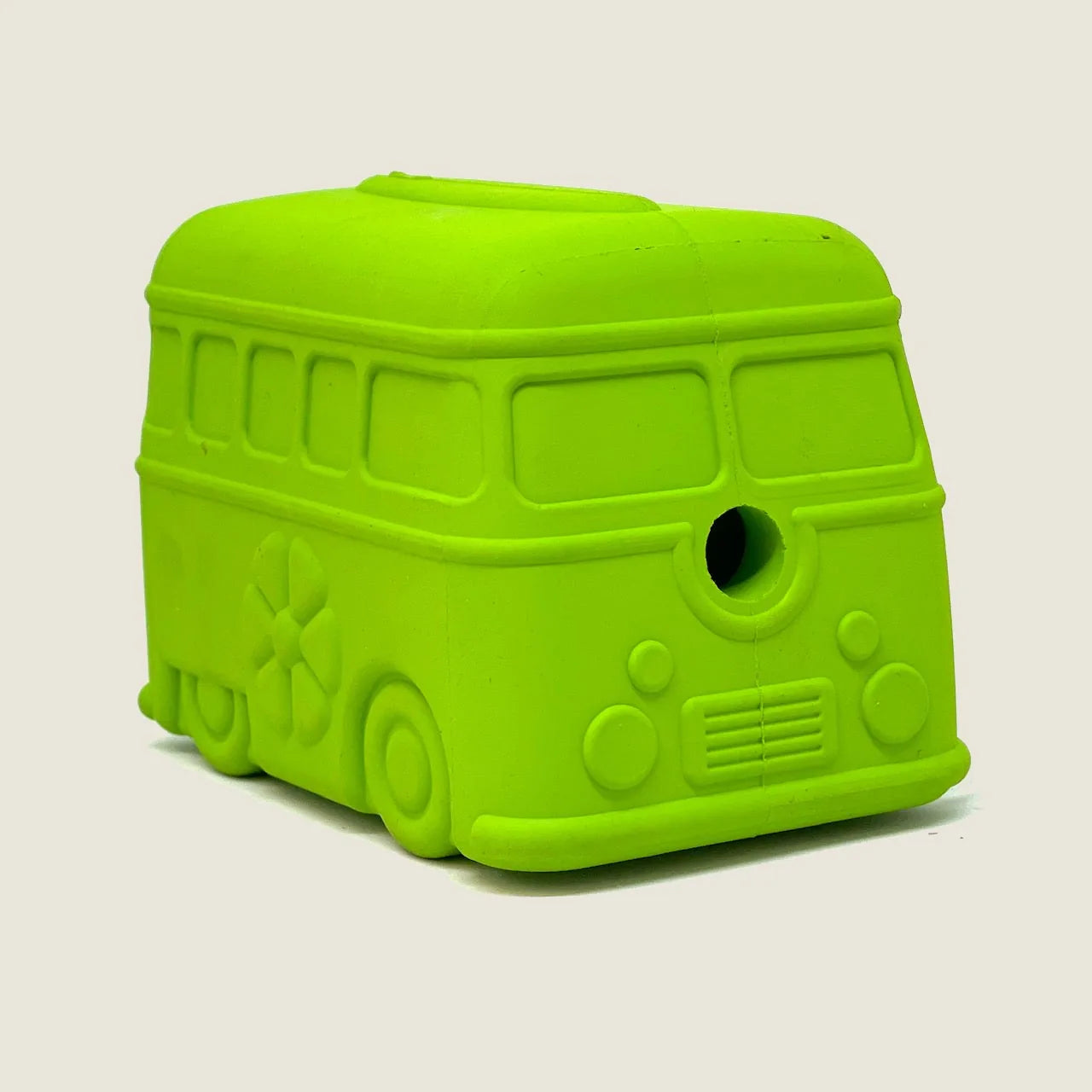 Vibrant green retro van-shaped rubber dog toy with textured details and a treat dispenser hole. Ideal for large chewers.