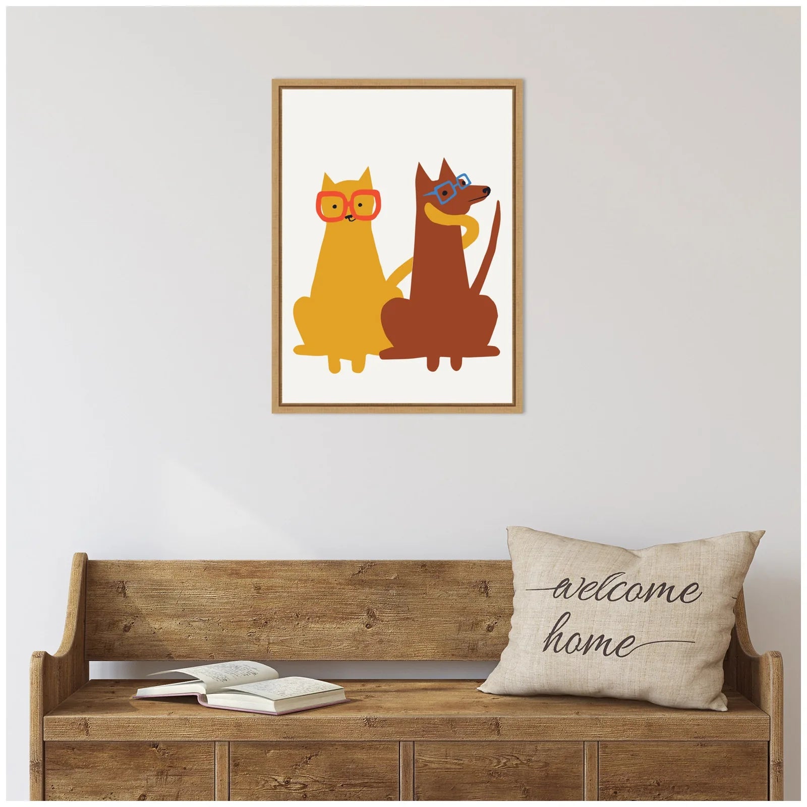 Framed canvas artwork featuring a yellow cat and brown dog wearing glasses against a white background.