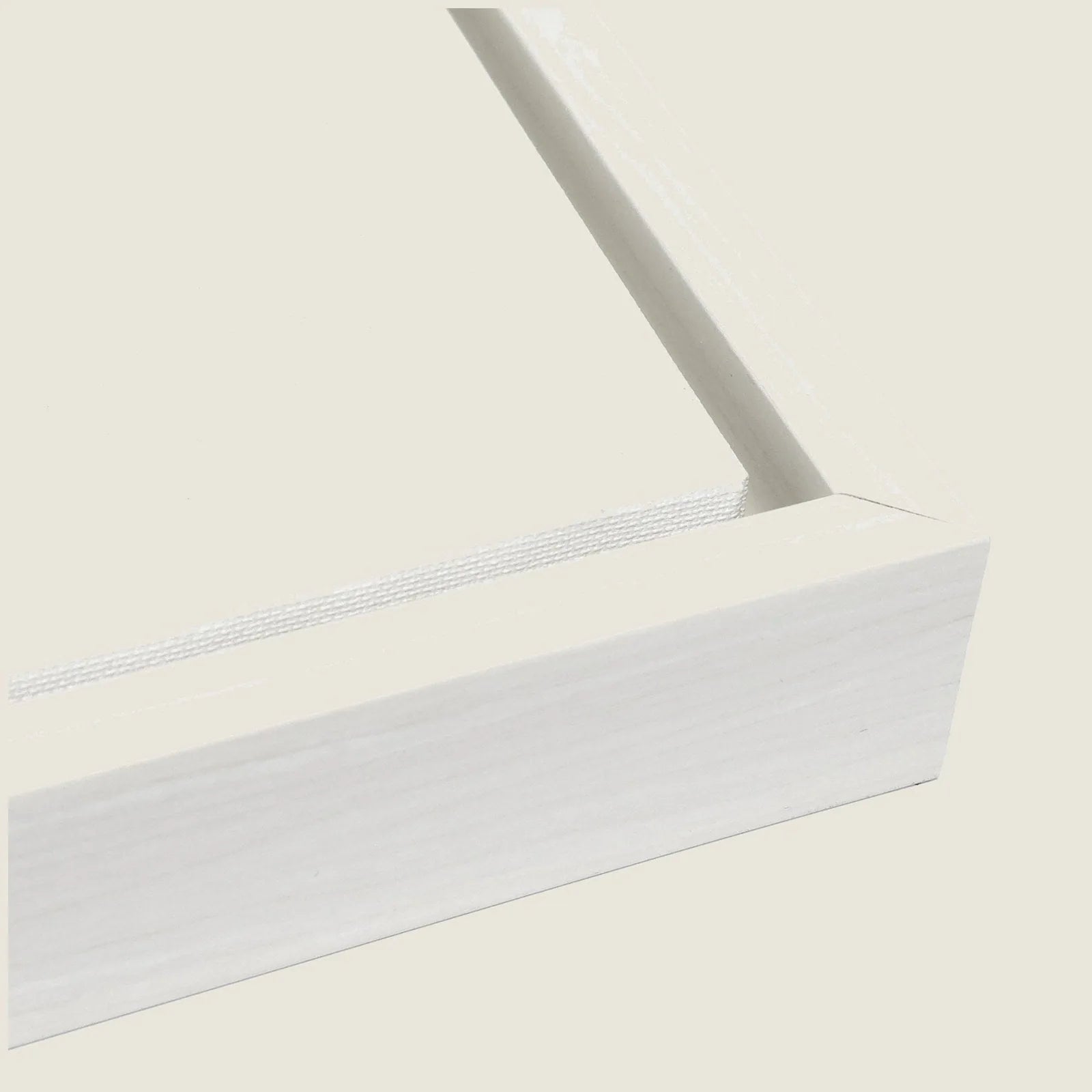 White polystyrene frame details of a gallery-wrapped canvas, showcasing a clean edge and modern design.
