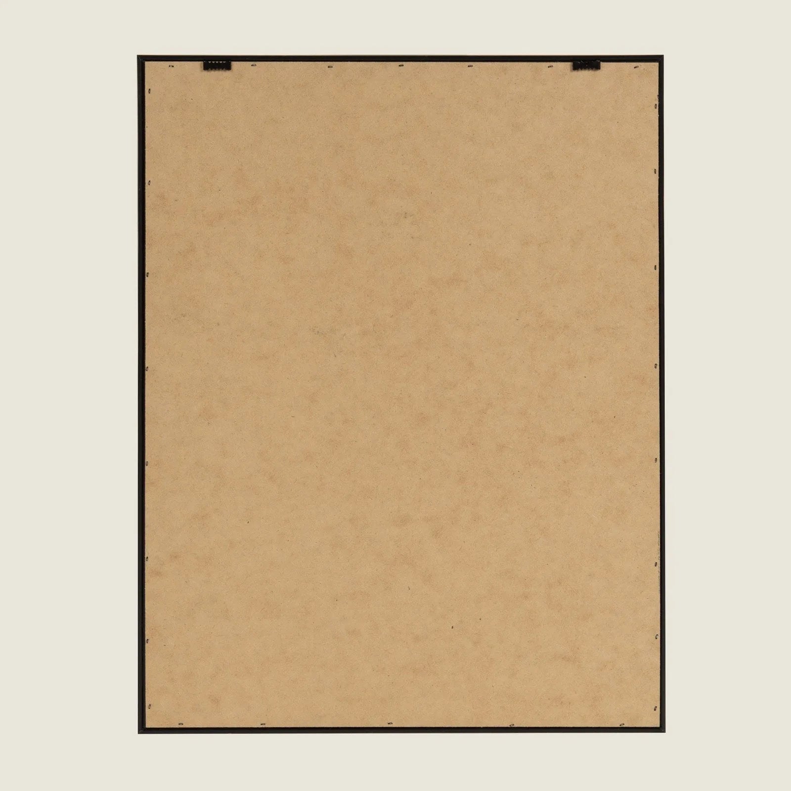 Smooth brown backing of a framed canvas ready for wall mounting, featuring a lightweight black frame.
