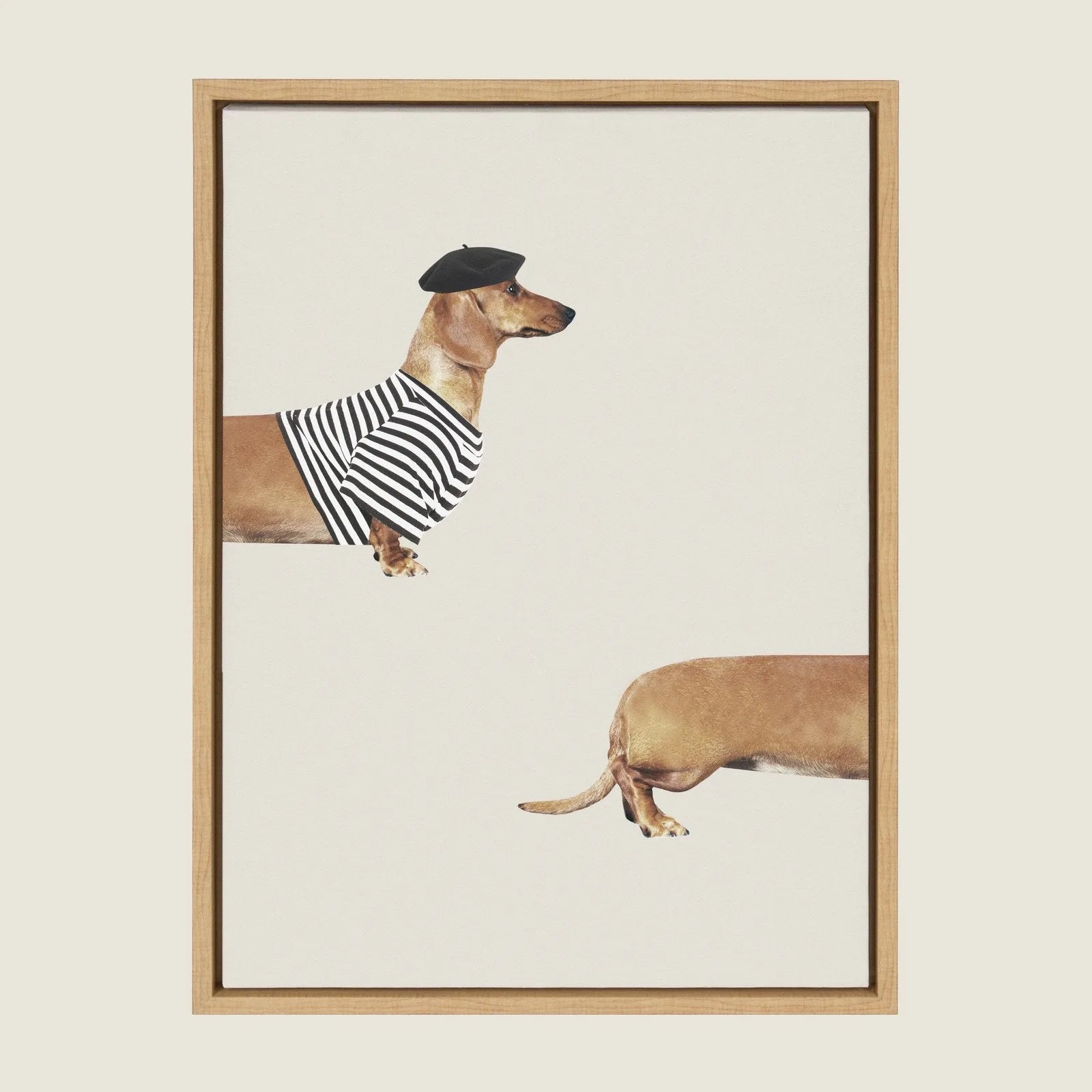 Framed canvas art featuring a long dog in a striped shirt and beret, with a light wood frame.