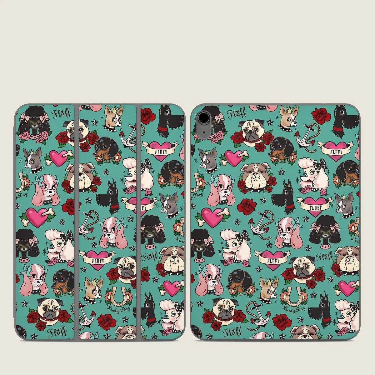 Colorful Tattoo Dogs tablet skin featuring various dog designs, hearts, and roses on a turquoise background.