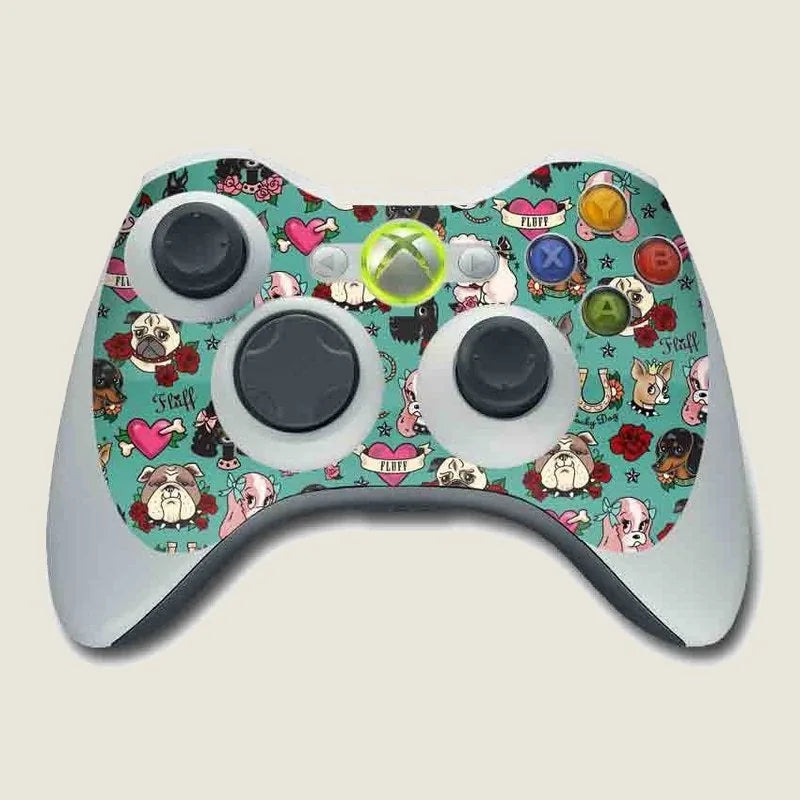 Colorful tattoo dog design on a Microsoft Xbox 360 controller skin, featuring various dog illustrations and hearts.