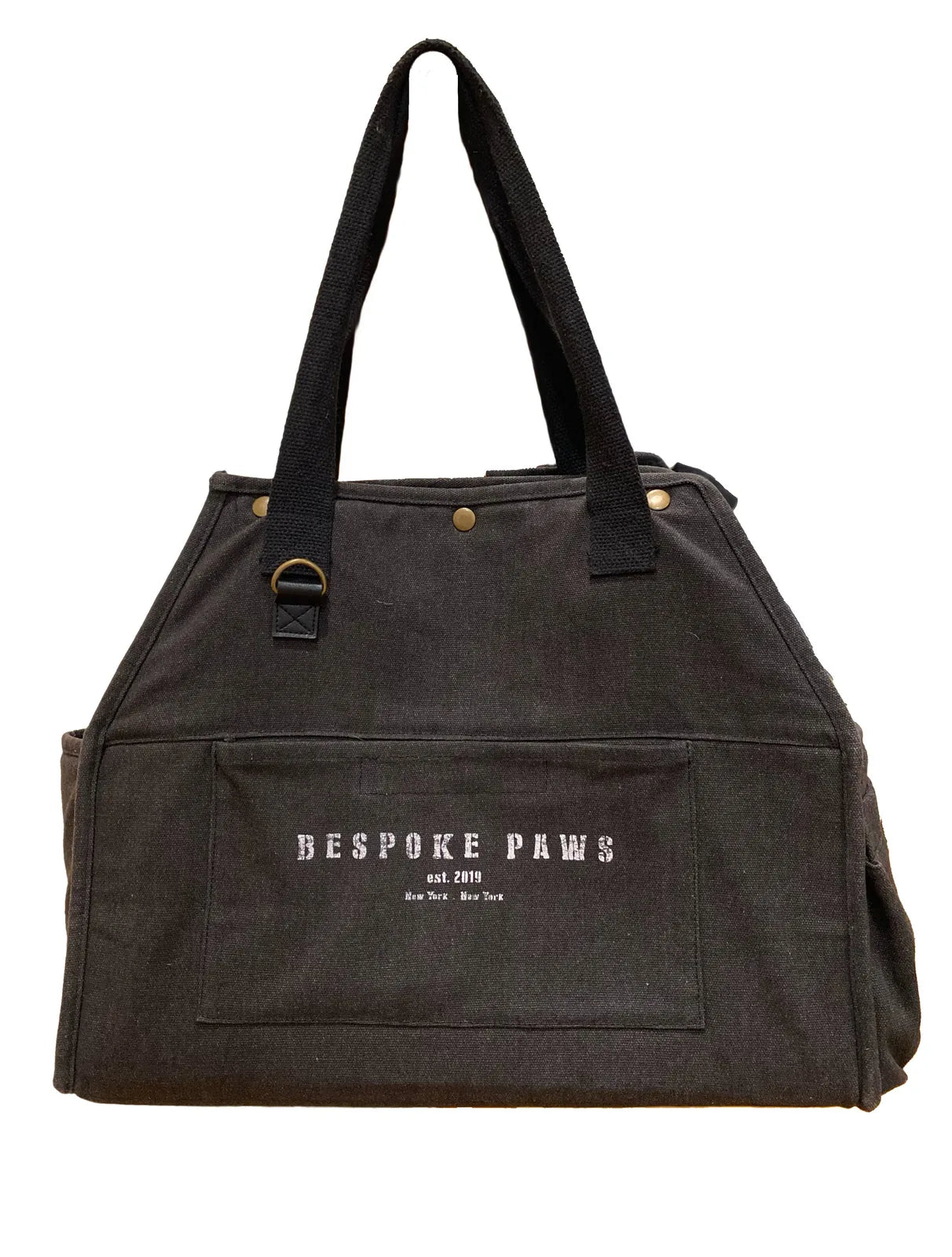 Stylish black pet carrier by BESPOKE PAWS, made from recycled cotton canvas with vegan leather trim.