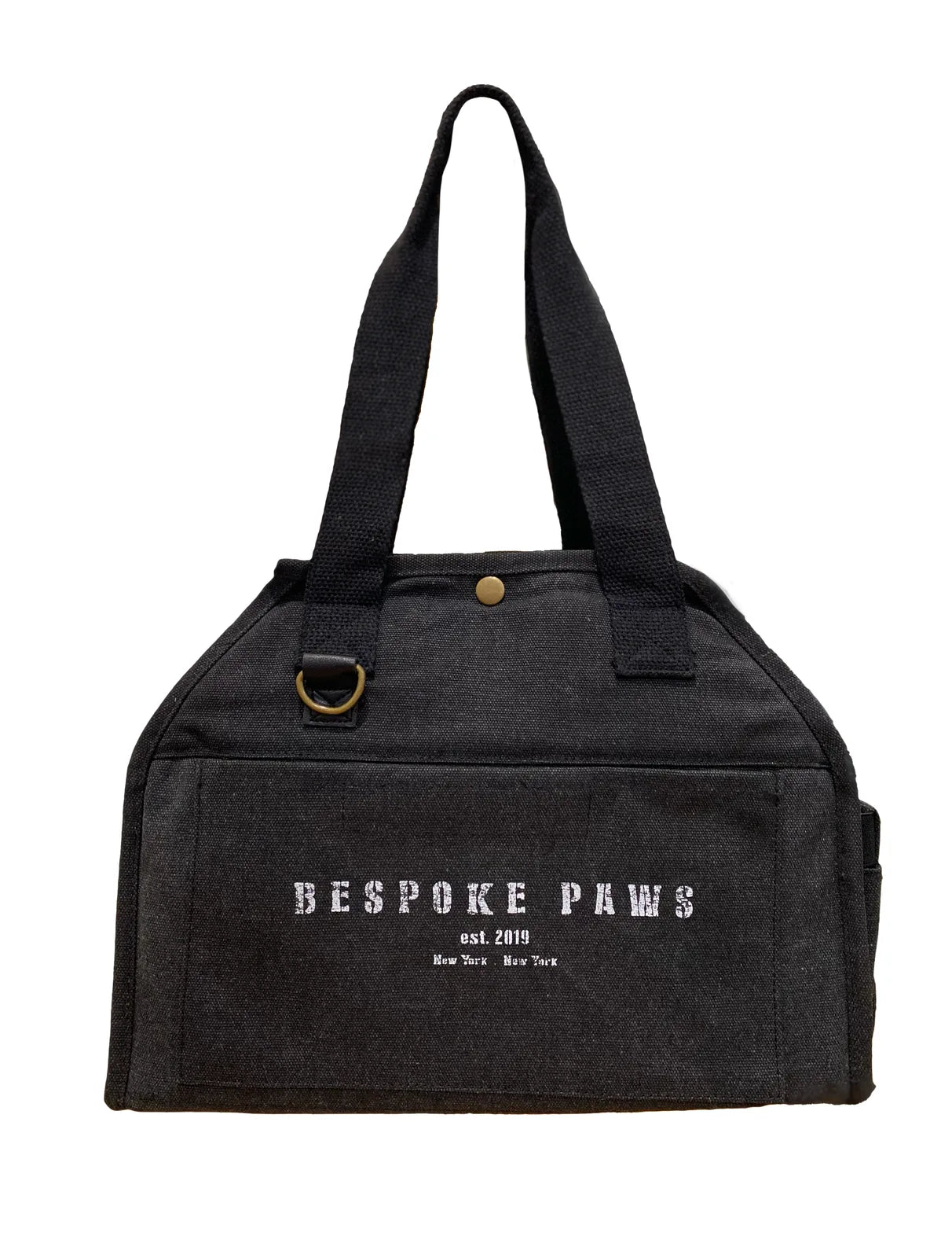 Black pet carrier by BESPOKE PAWS with sturdy handles, front pocket, and logo, perfect for stylish travel with small pets.