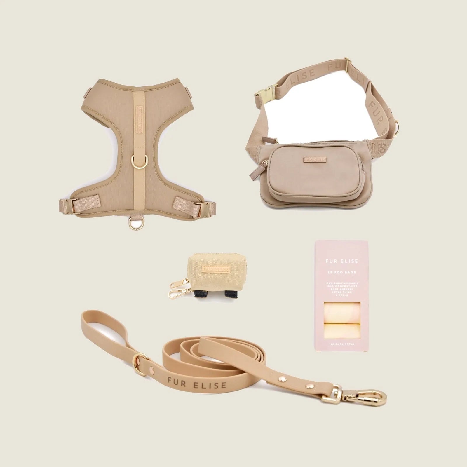Beige dog harness, leash, poo pouch, and waist bag set with gold accents, designed for stylish and practical walks.