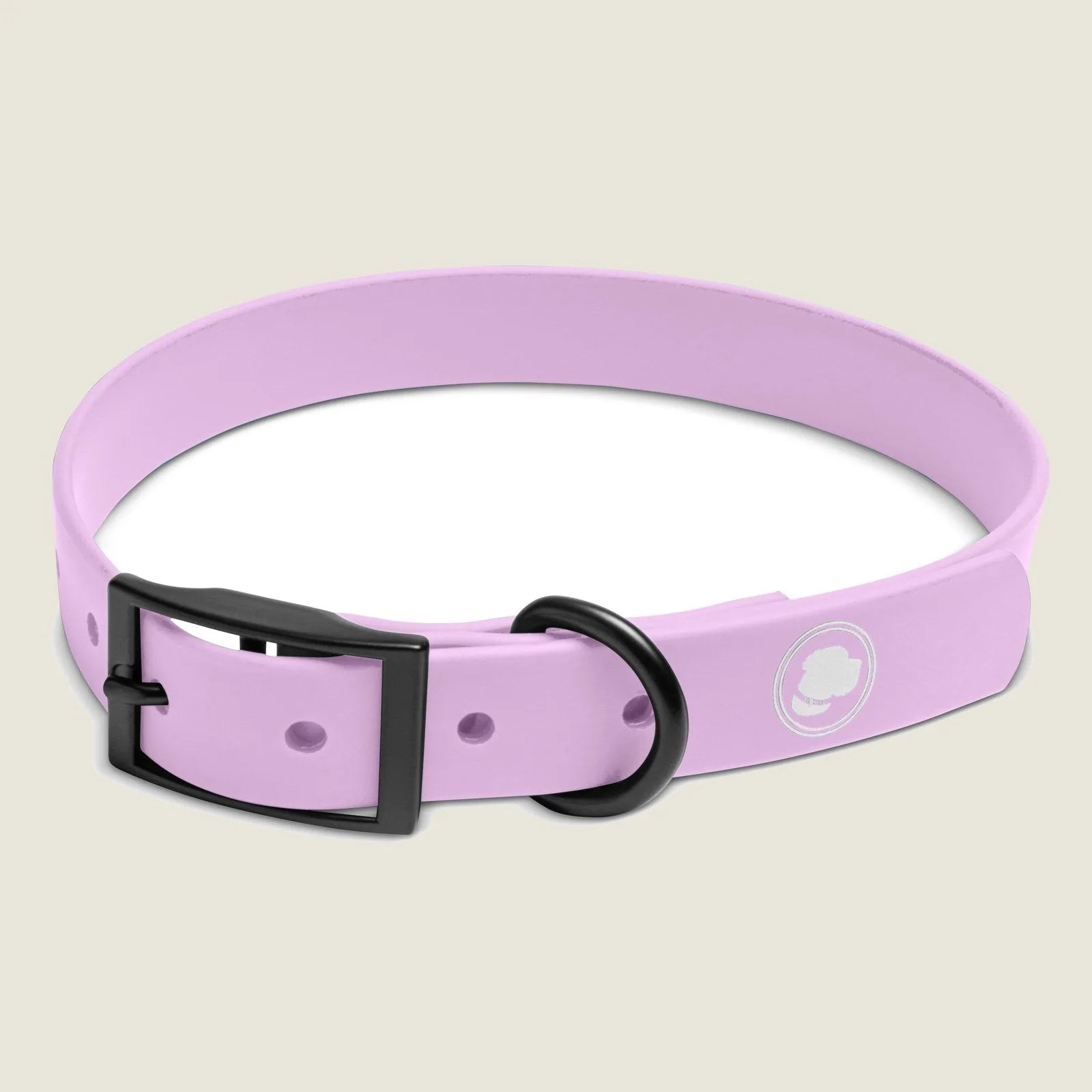 Blush pink adjustable dog collar with a black buckle and loop, designed for all-weather use.