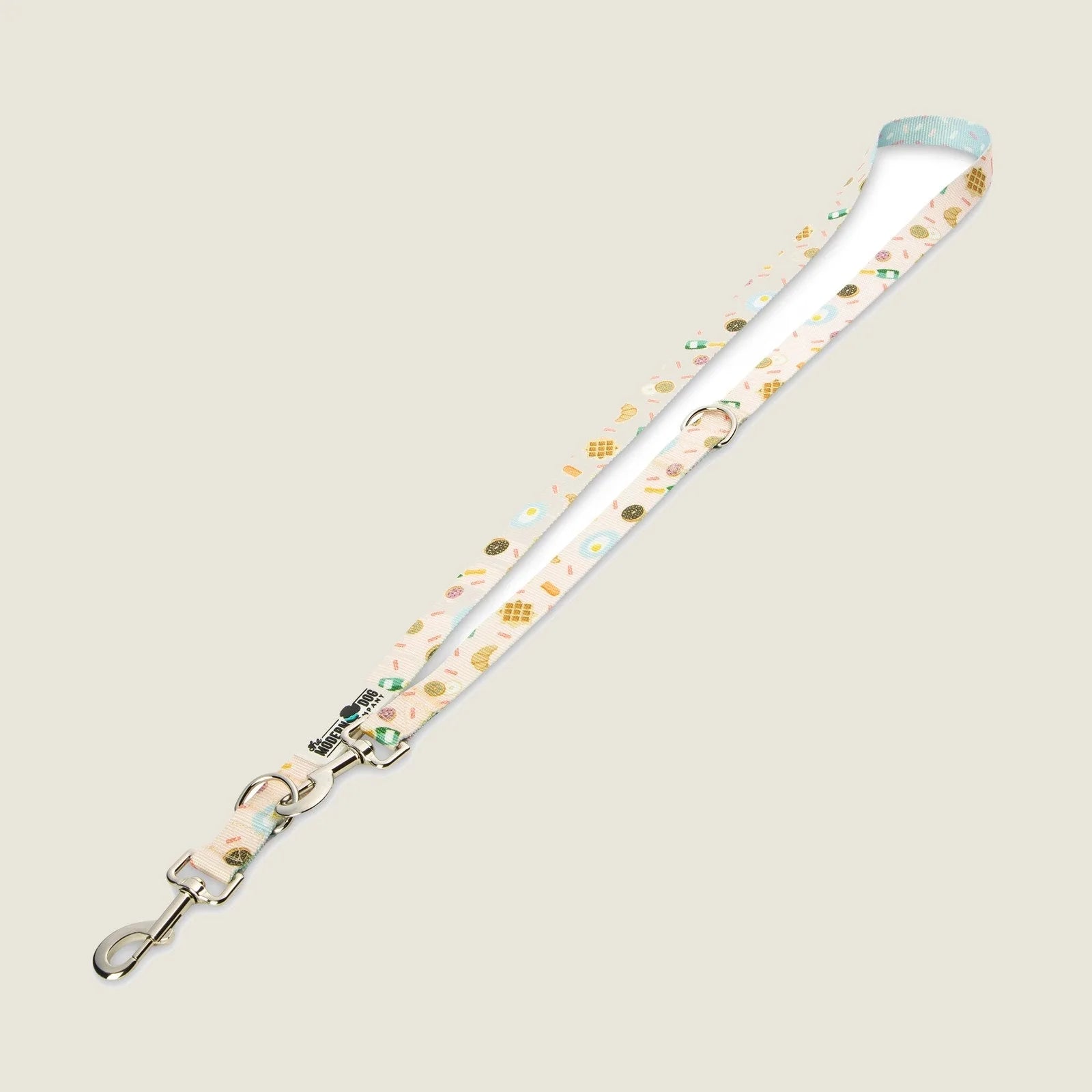 Adjustable dog leash featuring a playful brunch-themed pattern on a light background with silver swivel snaps.