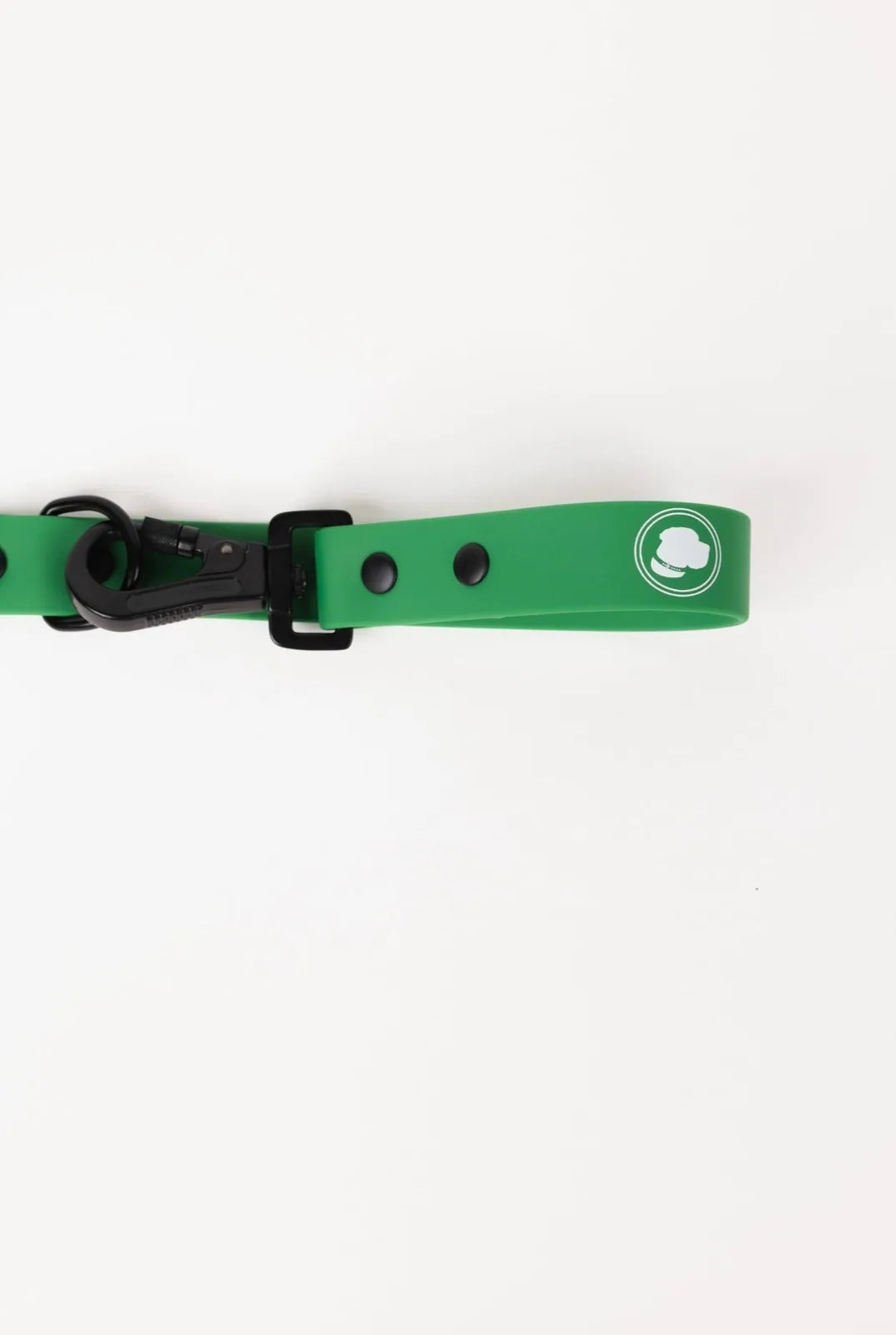 Adjustable Clover Green dog leash with a black clasp and logo, designed for everyday use and all-weather conditions.