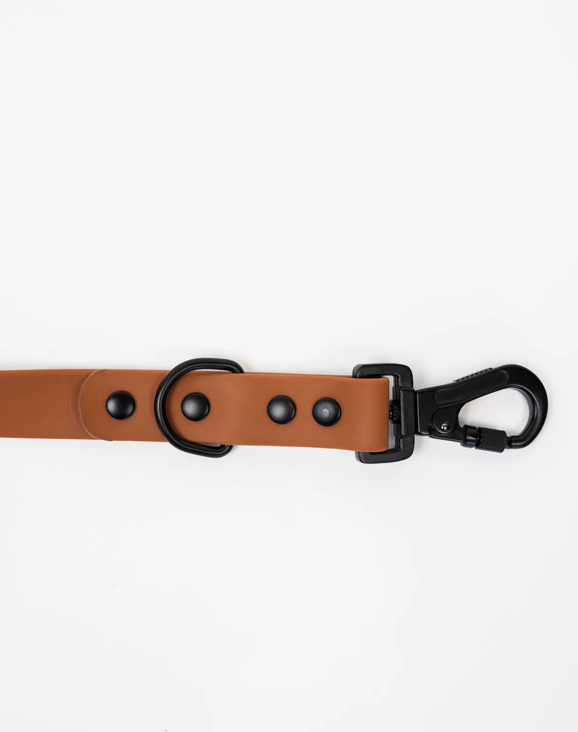 Coco Brown adjustable dog leash with black hardware, featuring snap hook and multiple length adjustment buttons.