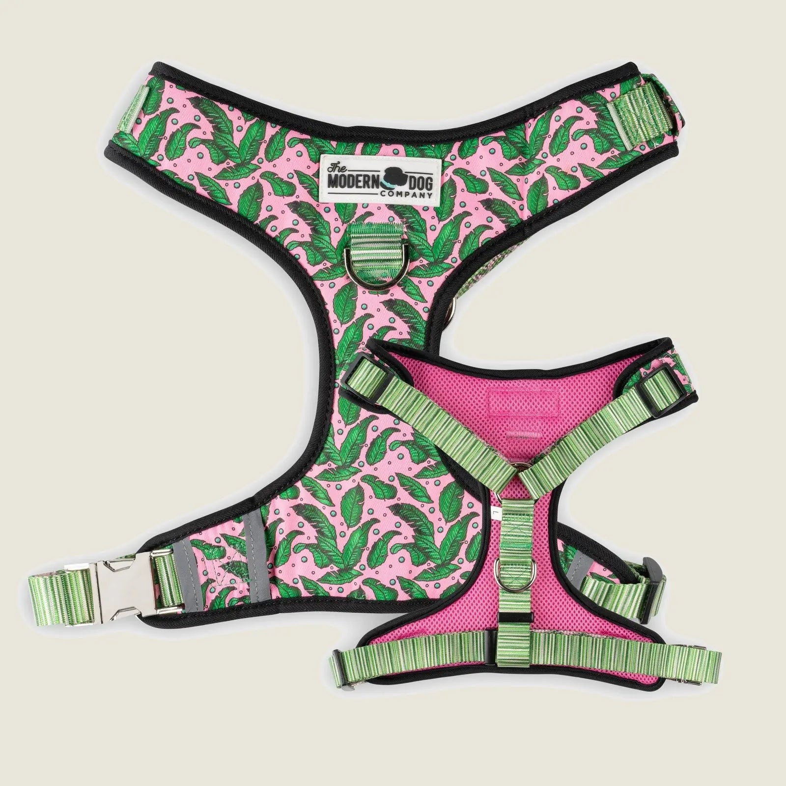 Pink Tropics dog harness featuring a leaf pattern, adjustable straps, and dual D-ring for leash attachment.