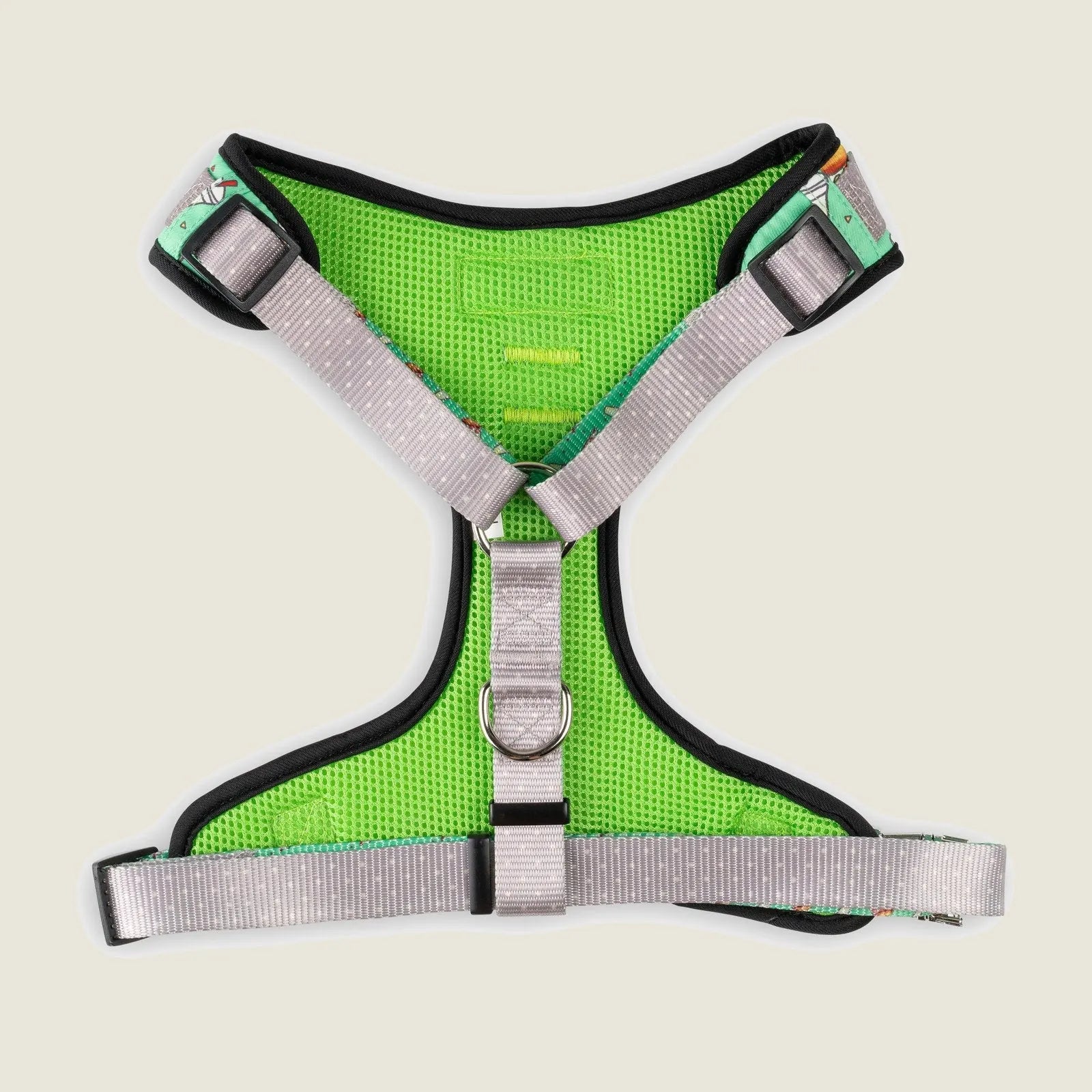 Vibrant green dog harness with adjustable gray straps and double D-ring, designed for comfort and secure walks.