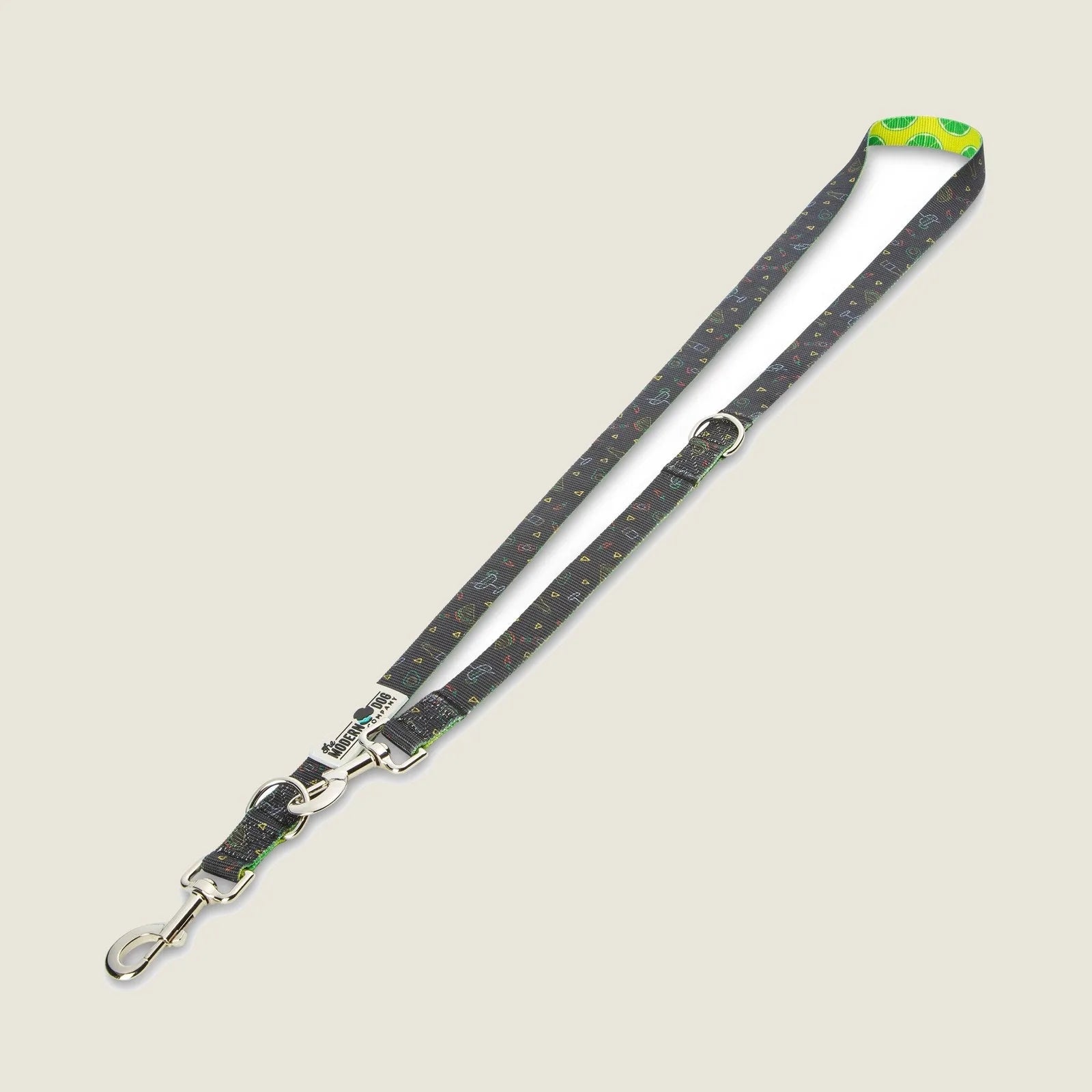 Adjustable dog leash featuring a retro Taco design, with black background and colorful patterns, and dual swivel bolt snaps.