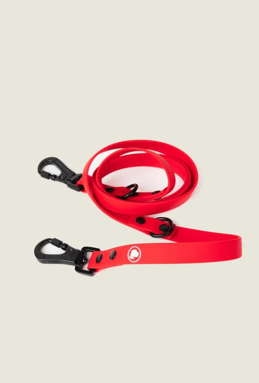 Ruby red adjustable dog leash with black clips, designed for all-weather use and easy cleaning.