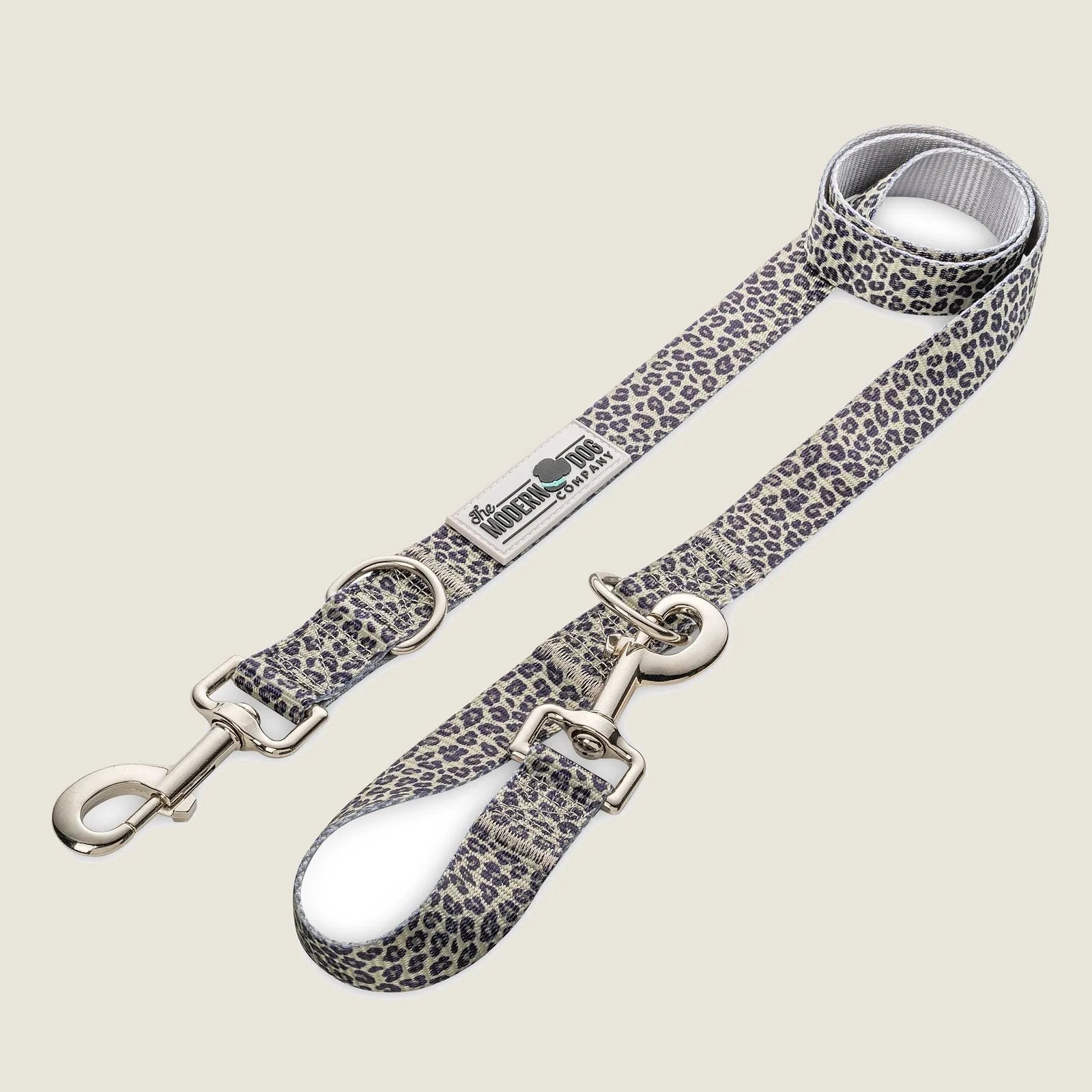 Stylish leopard print dog leash with adjustable lengths and silver hardware from The Modern Dog Company.